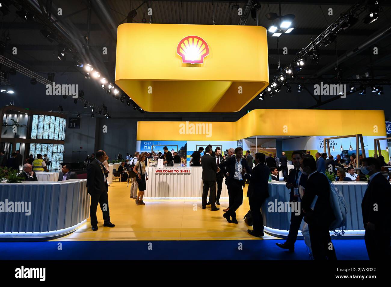 MILAN, ITALY - SEPTEMBER 6, 2022: a view of the Shell stand during Gastech 2022 trade show event in Milan Fair. Visitors and people in the hall walk through exhibitors stands and exhibit booths. Stock Photo