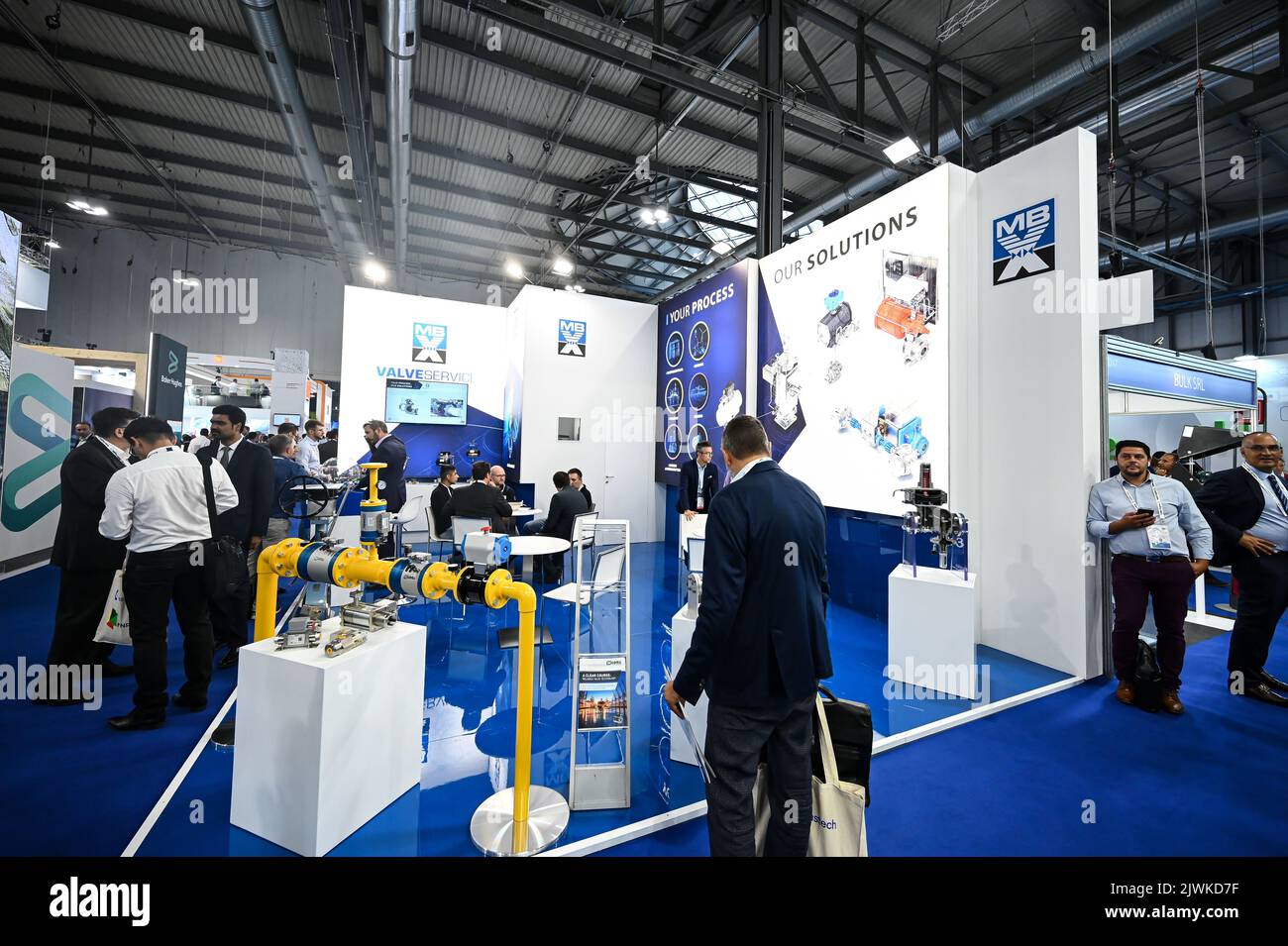 MILAN, ITALY - SEPTEMBER 6, 2022: a view of the MB Valveservice stand during Gastech 2022 trade show event in Milan Fair. Visitors and people in the hall walk through exhibitors stands and exhibit booths. Stock Photo