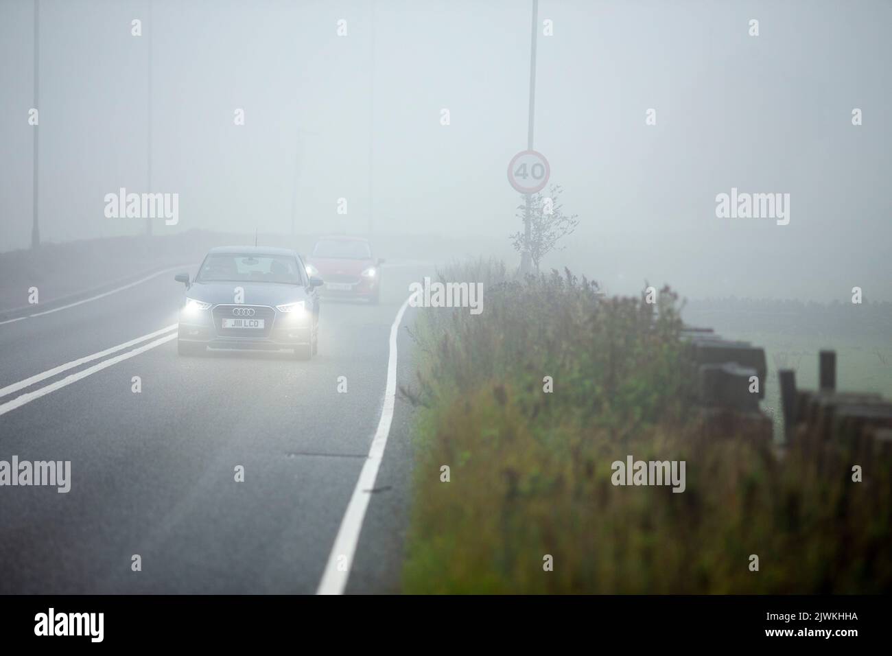 West Yorkshire, 6th September 2022  Drivers navigate through thick mist on the A644 in West Yorkshire as the heatwave gives way to rain and misty weather.   Credit: Windmill Images/Alamy Live News Stock Photo