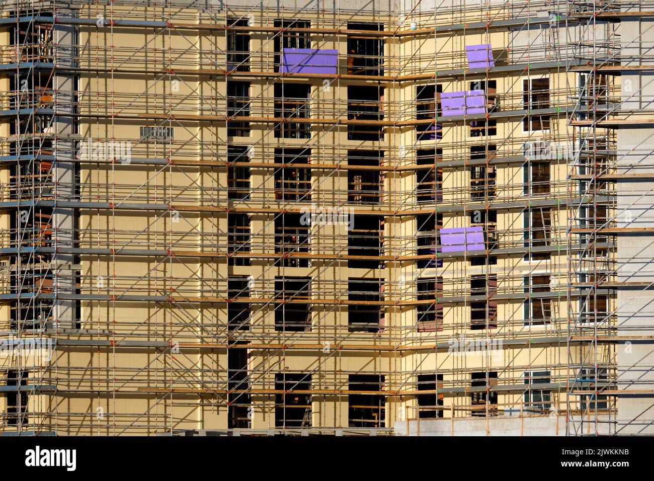 View of Tower lifting cranes at high residential apartment buildings ...