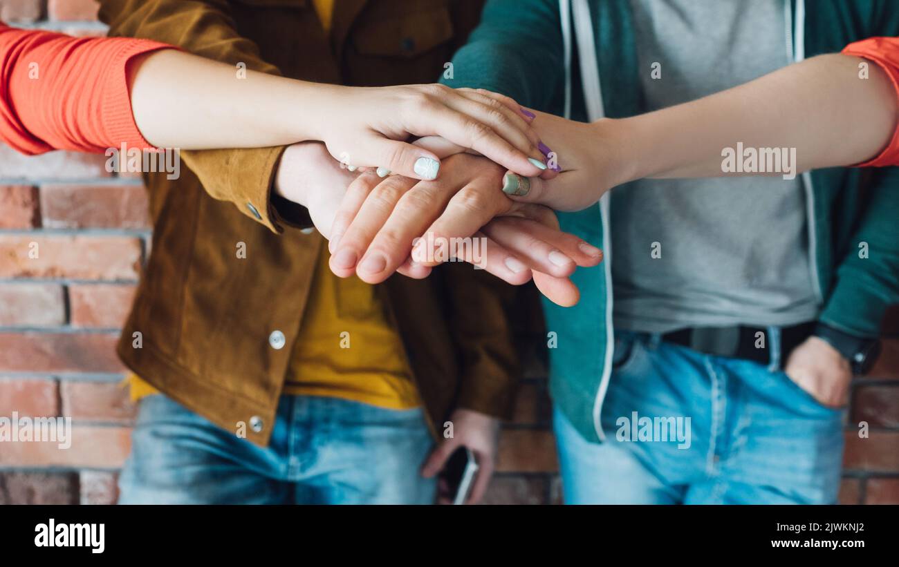 hands together equality teamwork success support Stock Photo