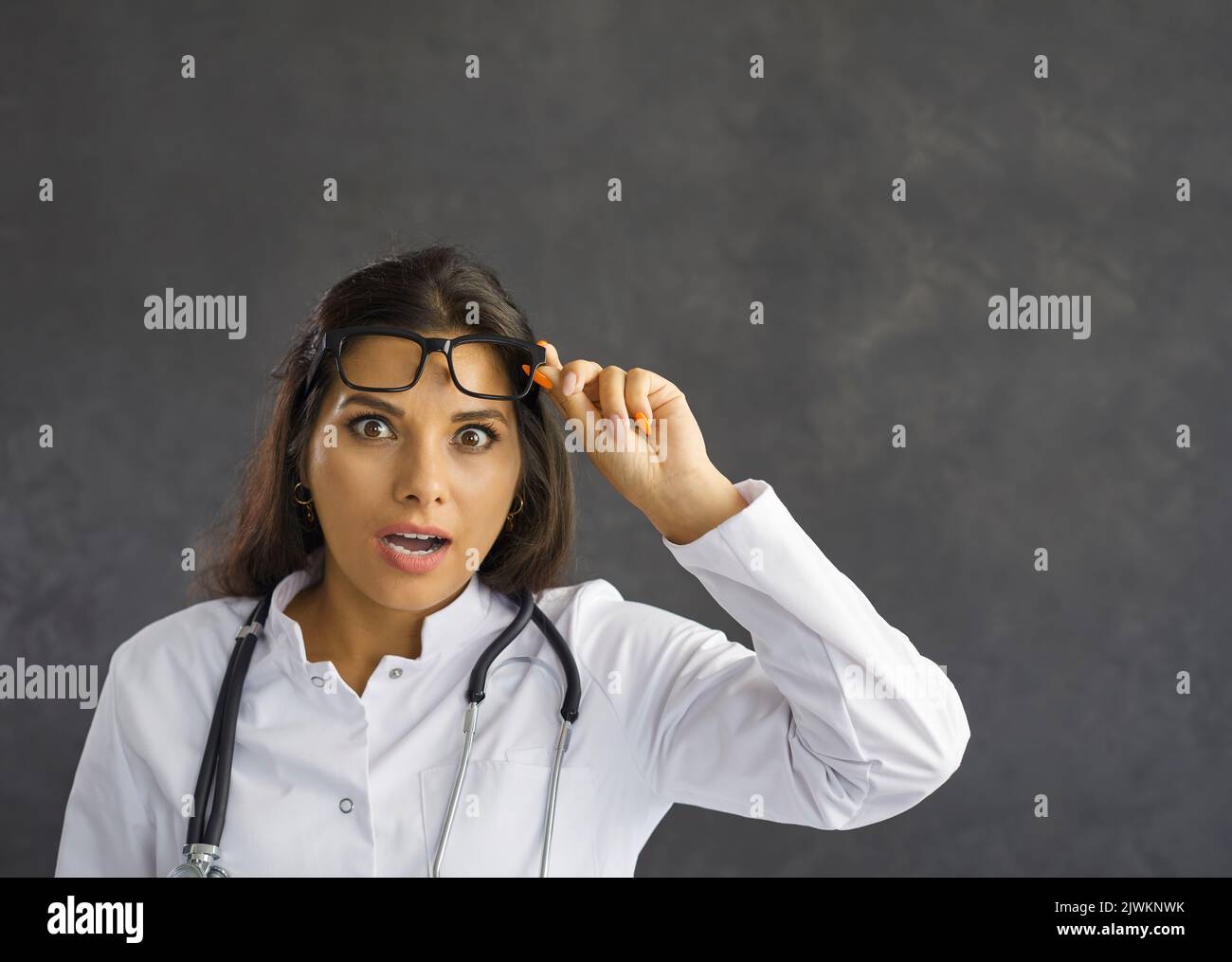 Portrait of amazed woman doctor feel shocked Stock Photo Alamy