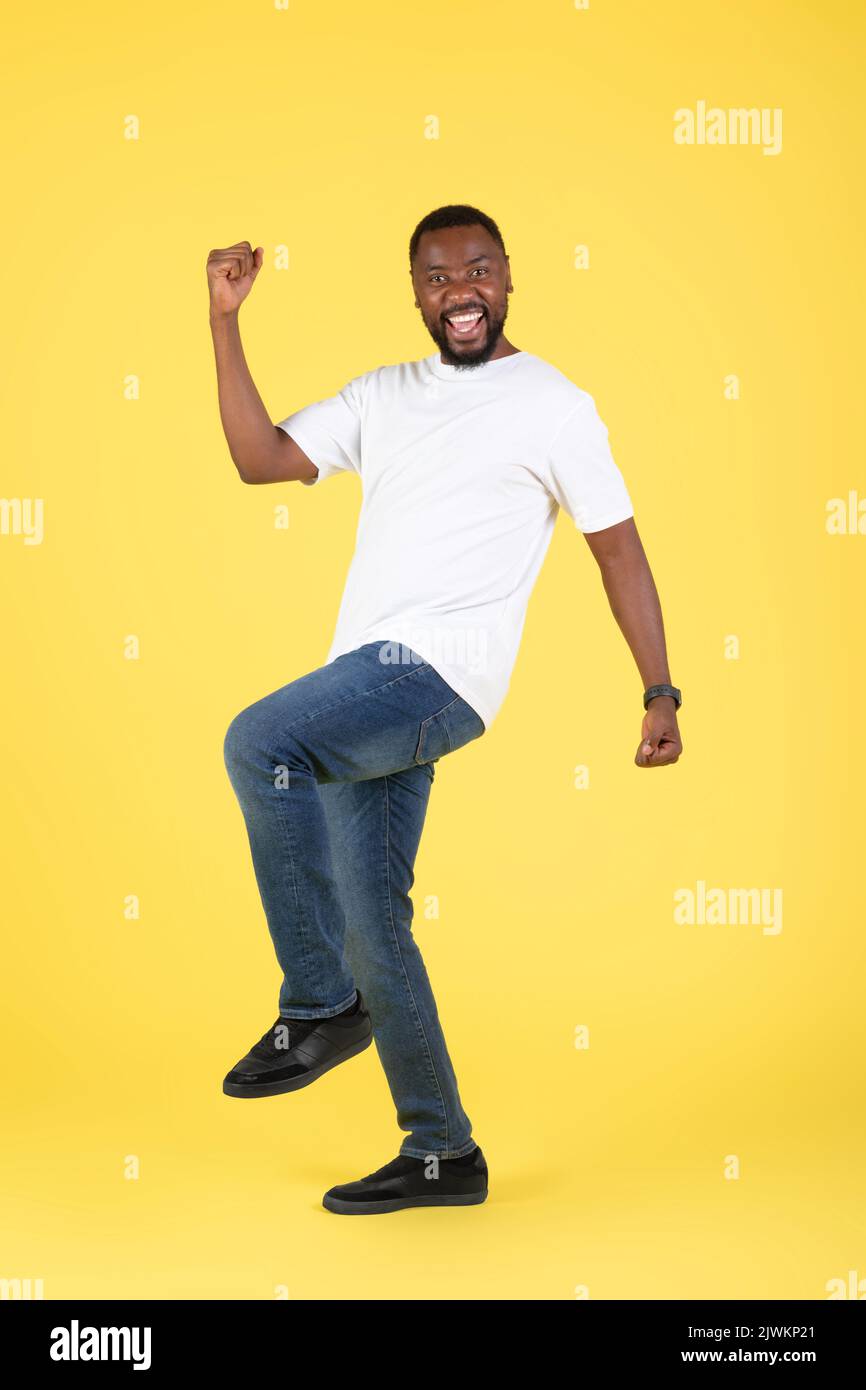 Joyful Black Man Gesturing Yes Standing Over Yellow Background ...