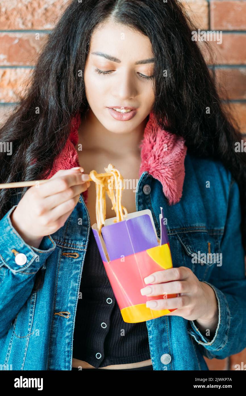 youth eating habit female chinese noodles yummy Stock Photo Alamy