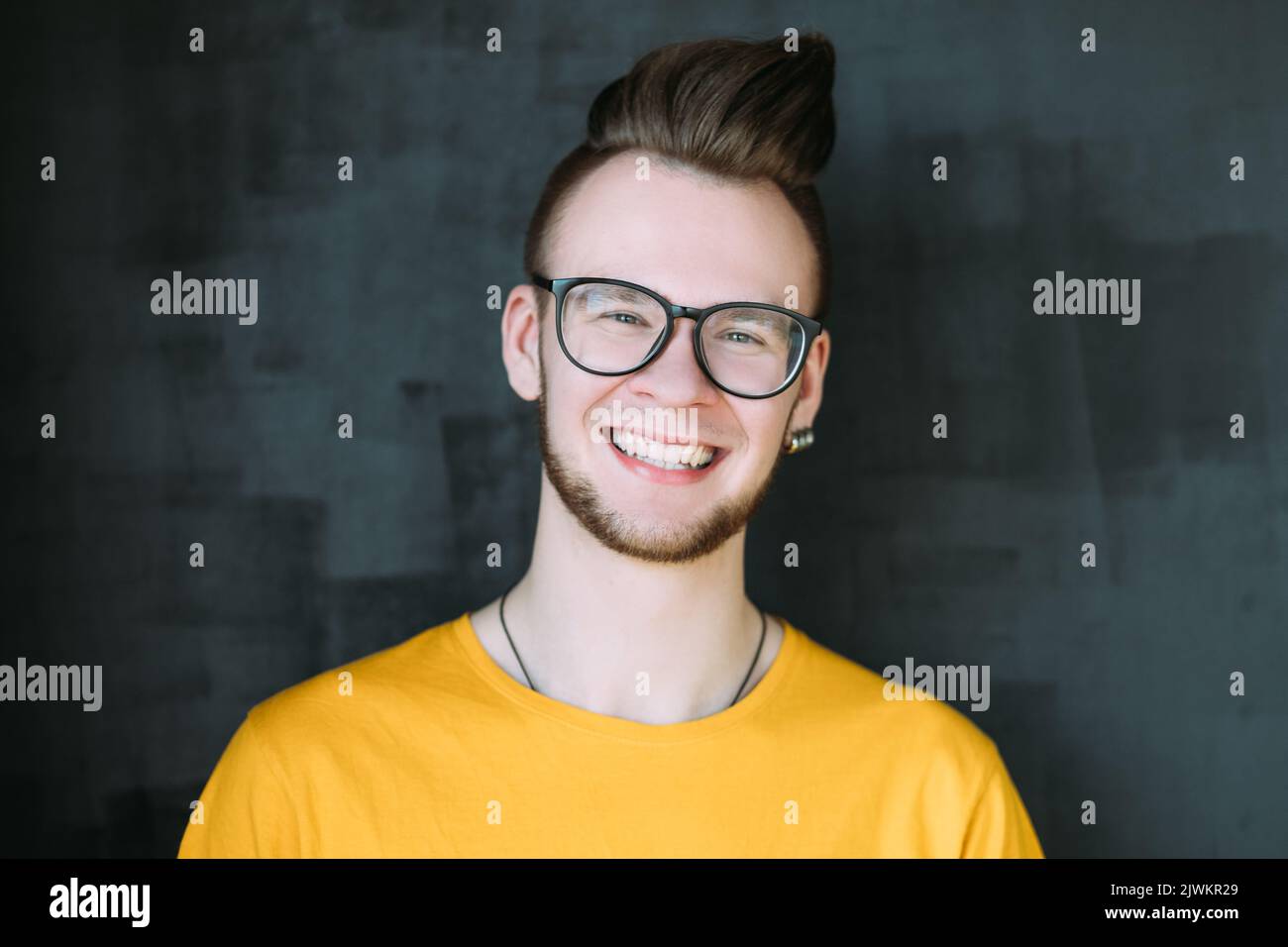 cheerful happy emotional hipster guy portrait Stock Photo