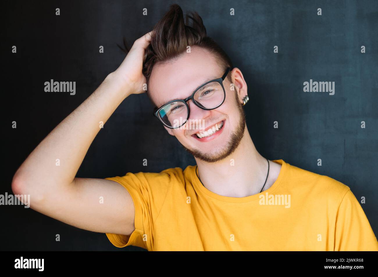 millennial portrait happy smiling bearded hipster Stock Photo