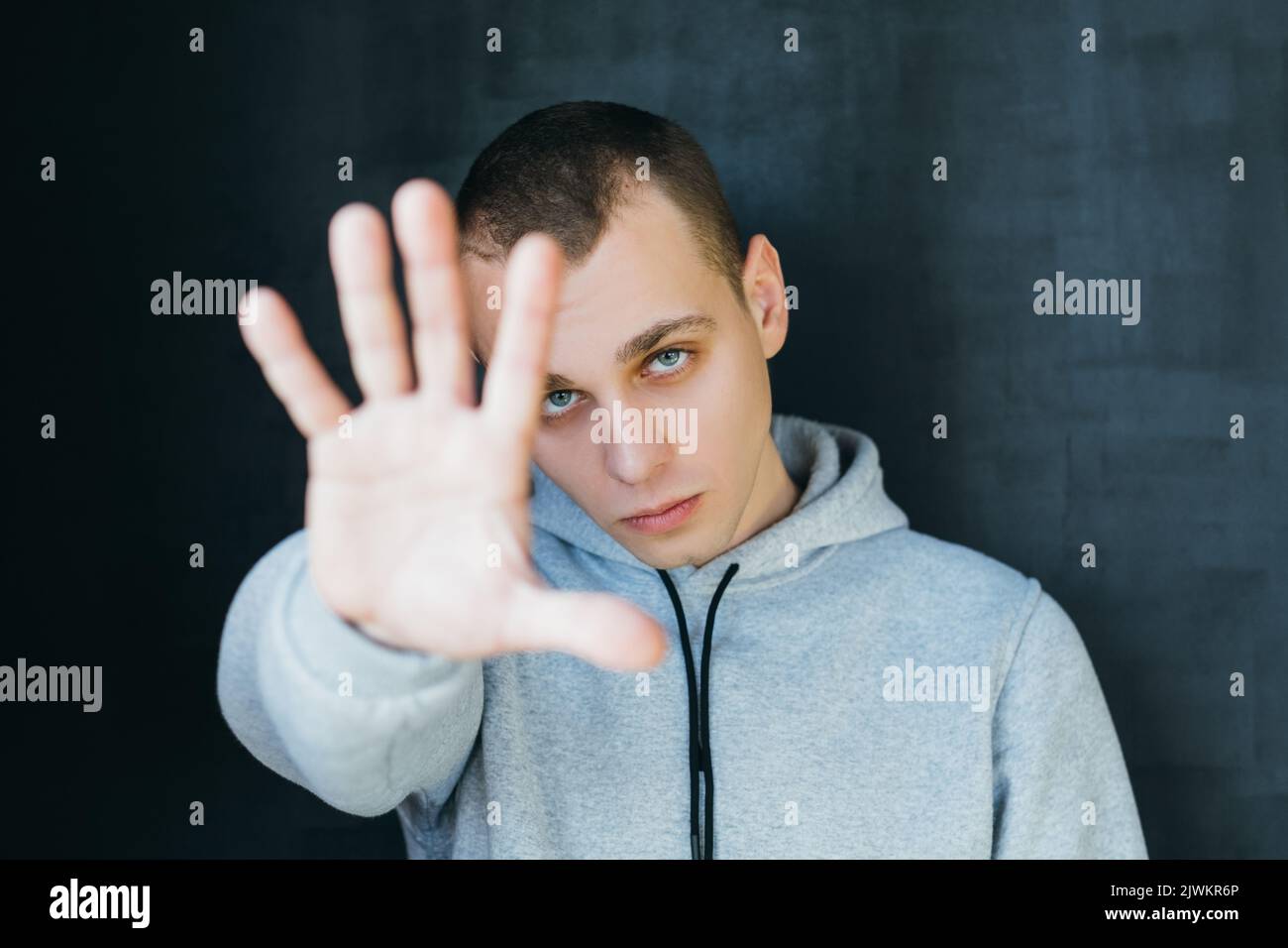 enough handsome guy stop gesture personal privacy Stock Photo