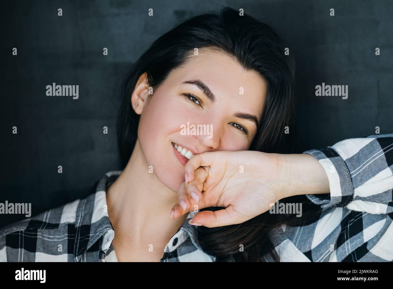 young woman relaxed happy friendly brunette Stock Photo