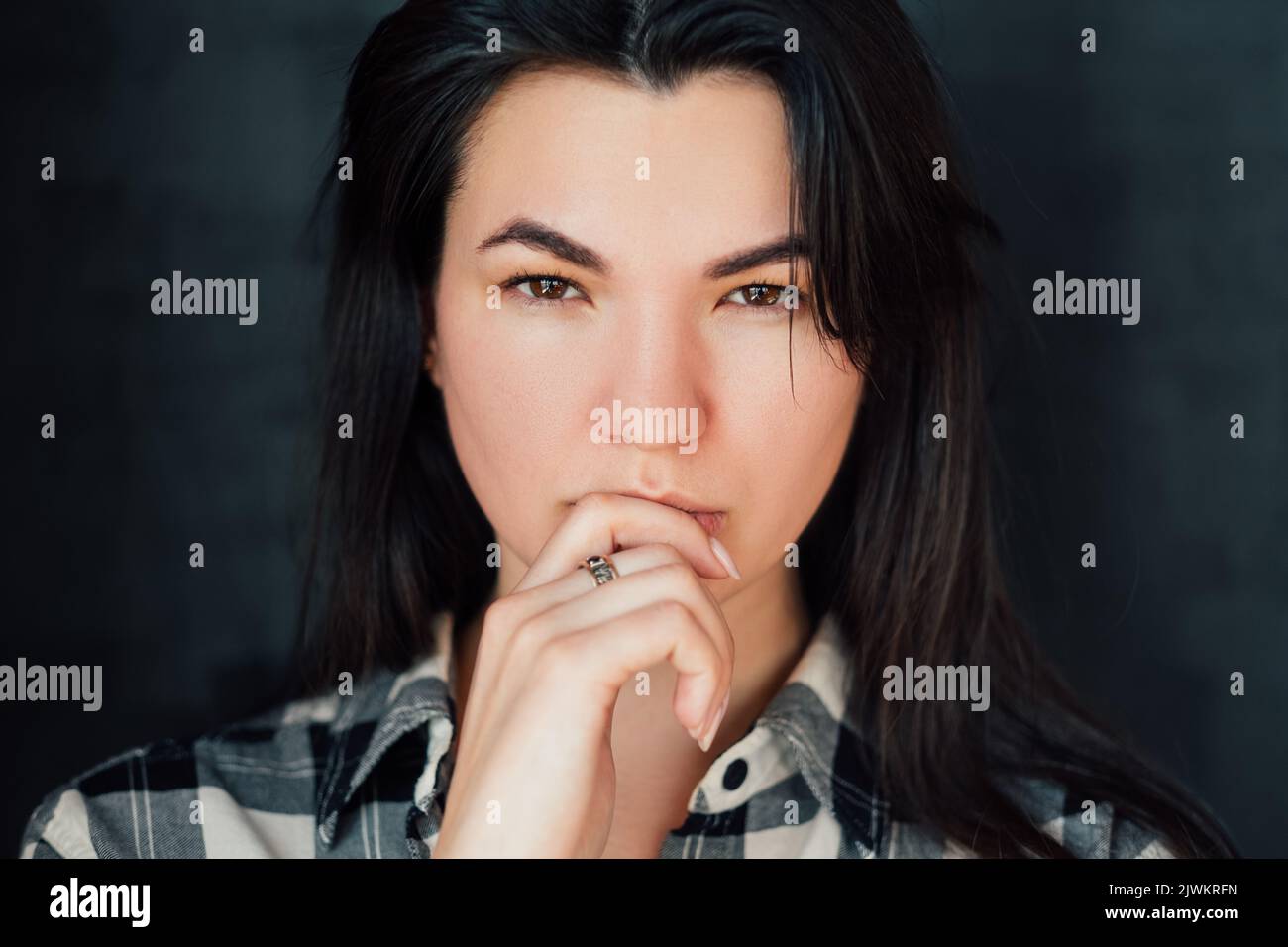 young woman speculation thoughtful decision time Stock Photo
