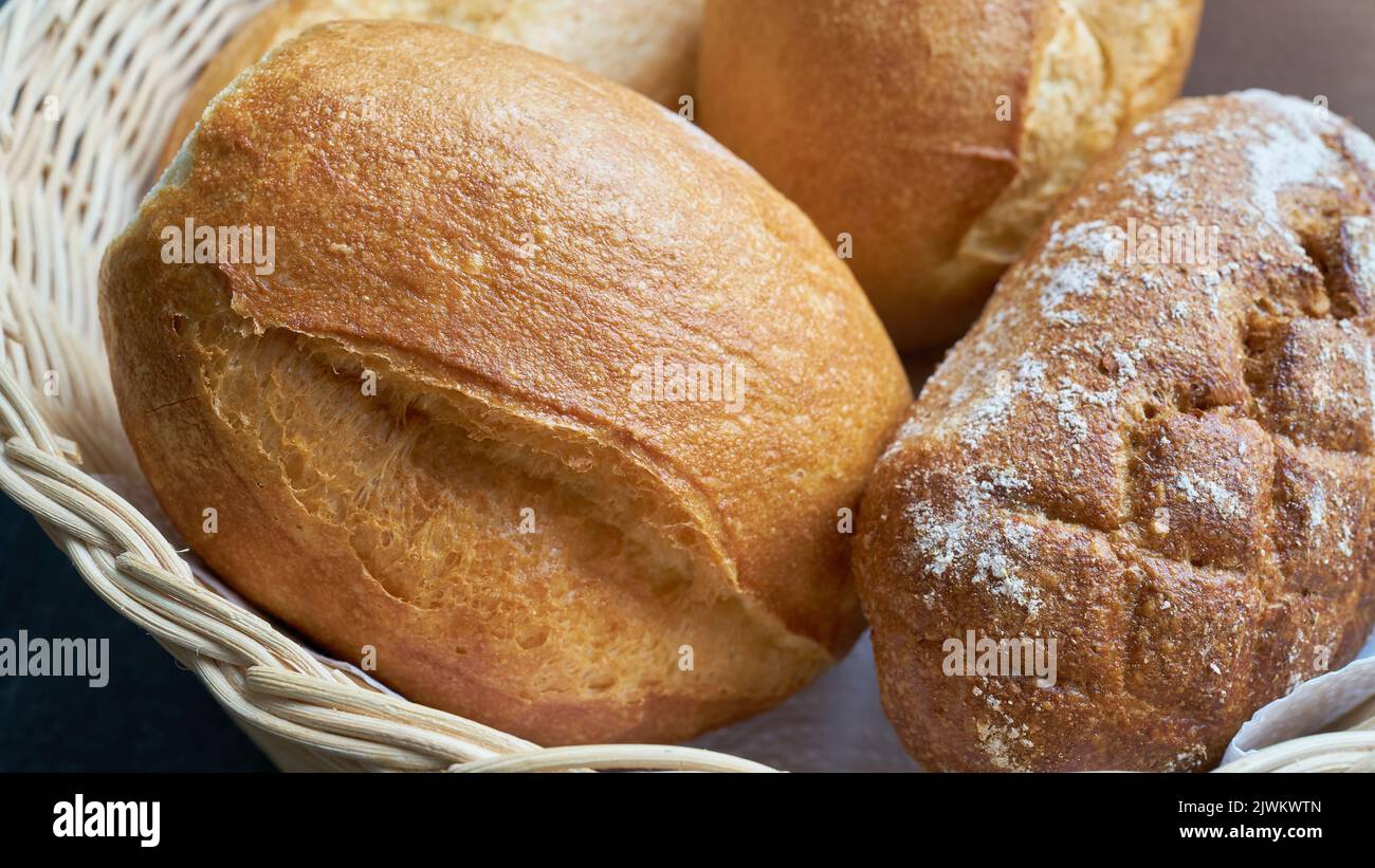 Fresh rolls from the baker for breakfast on a table Stock Photo