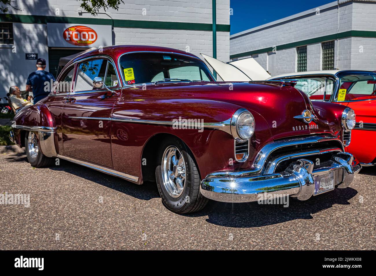 Falcon Heights, MN - June 17, 2022: Low perspective front corner view of a 1949 Oldsmobile Rocket 88 Coupe at a local car show. Stock Photo