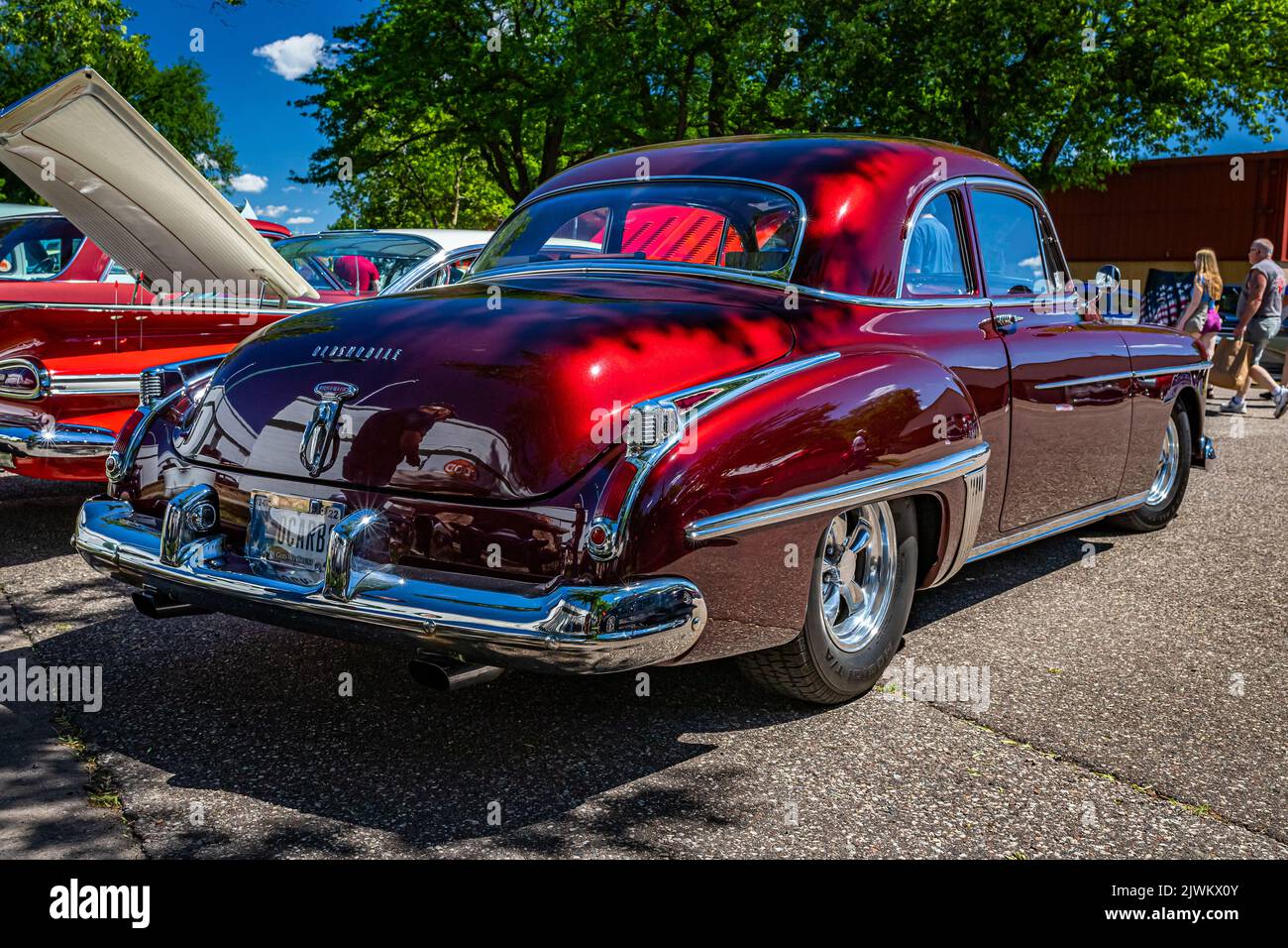 Falcon Heights, MN - June 17, 2022: Low perspective rear corner view of a 1949 Oldsmobile Rocket 88 Coupe at a local car show. Stock Photo