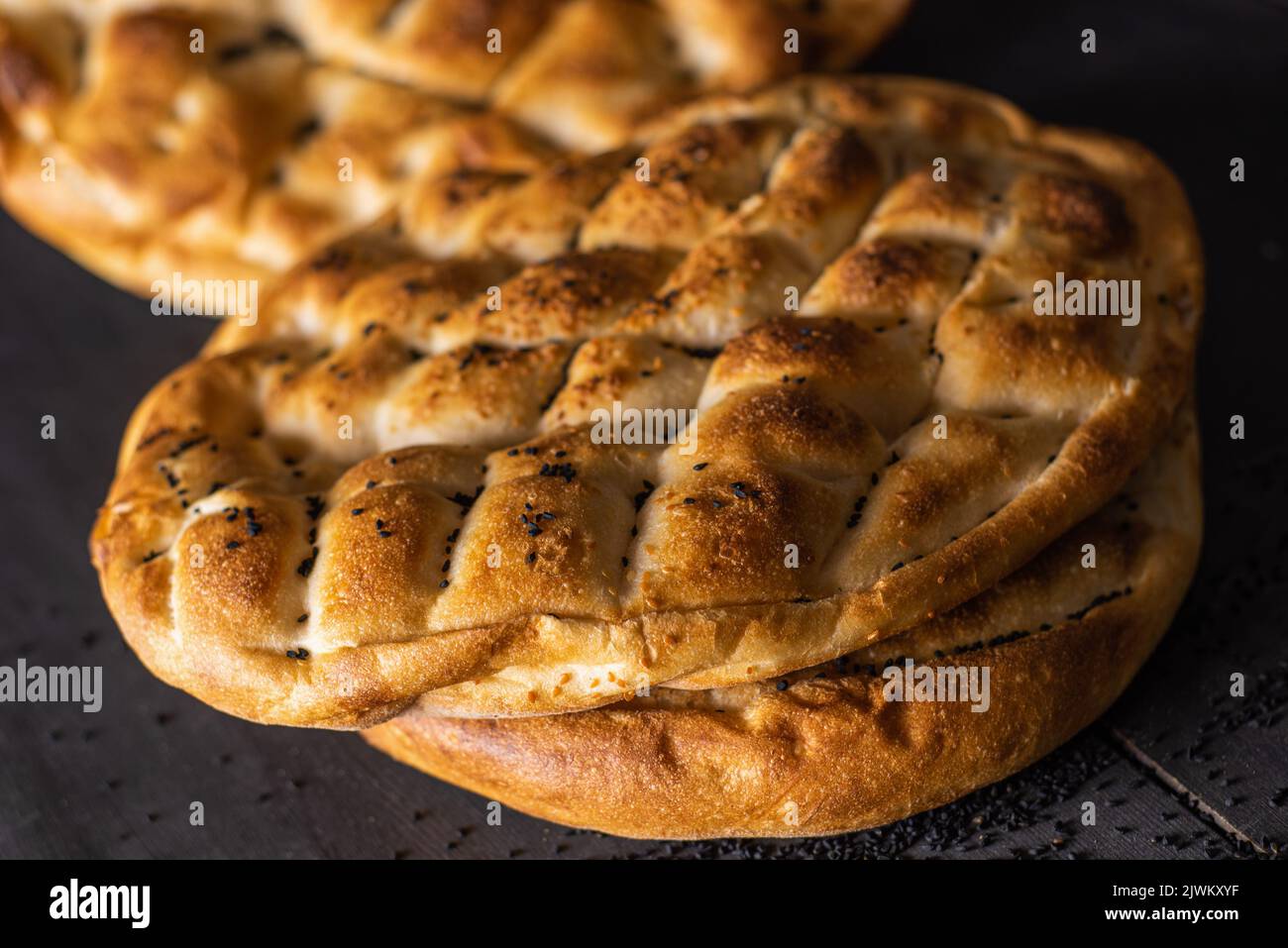 Ramadan Pita (Ramazan Pidesi). Traditional Turkish bread for holy month Ramadan. Dark food