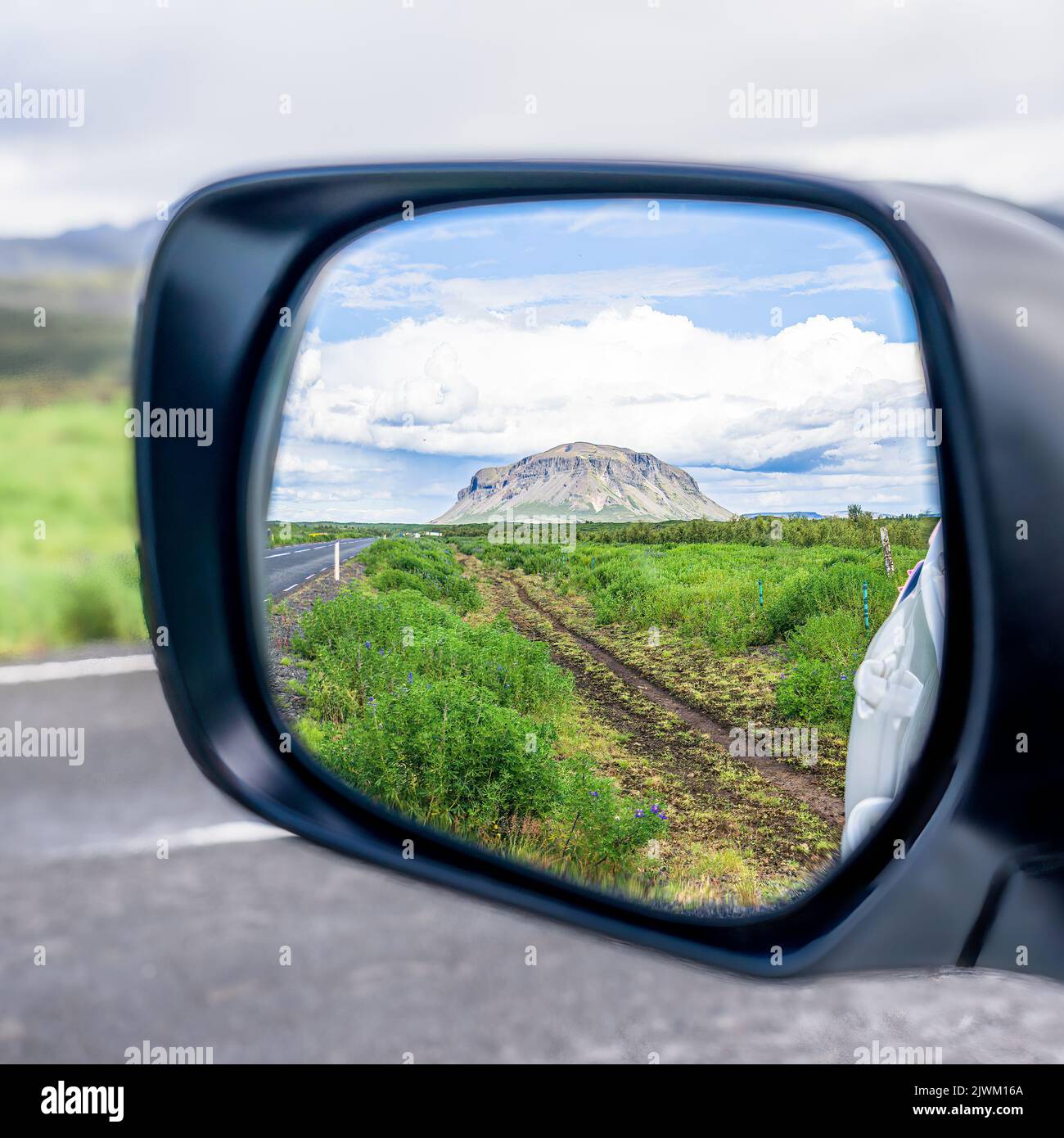 Looking back, over my shoulder.. at Búrfell, Iceland.  The mountain is a basalt tuya, with tuya being a type of volcano formed when lava erupts throug Stock Photo