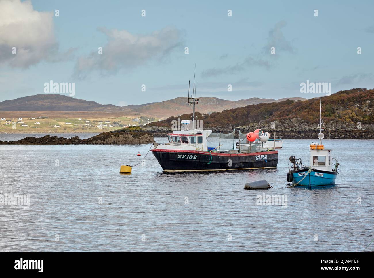 Fishing vessels Sealgairmara and Sula seen from Dry Island, Bedachro, Scotland. Stock Photo