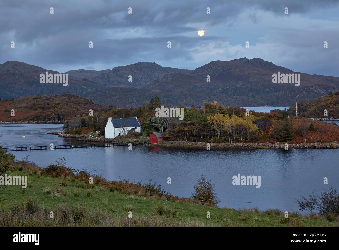 View of Dry-Island by moon light, Bedachro, Scotland. Stock Photo