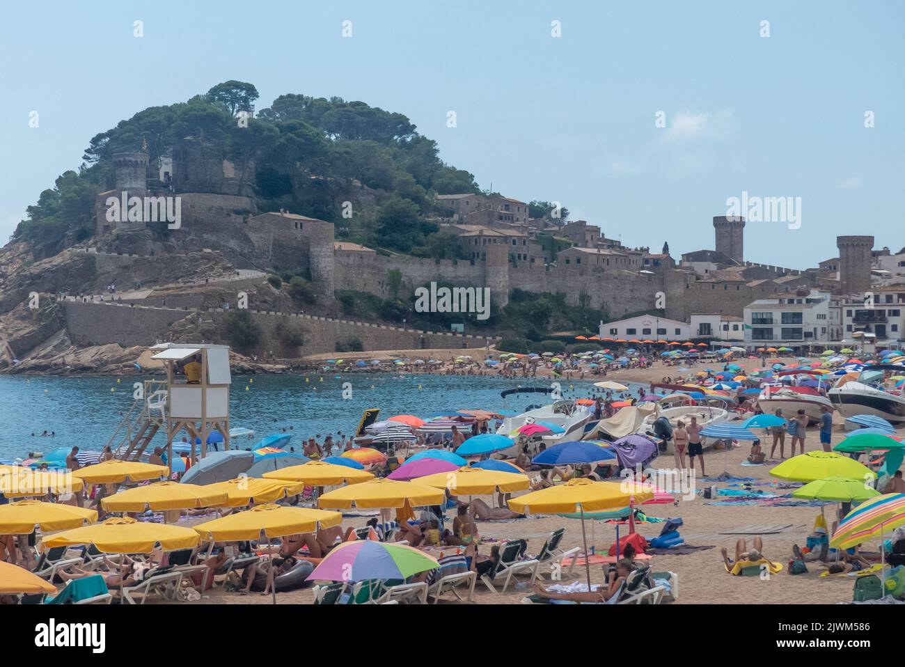 Catalonia in Spain: the beach at the pretty resort of Tossa de Mar Stock Photo