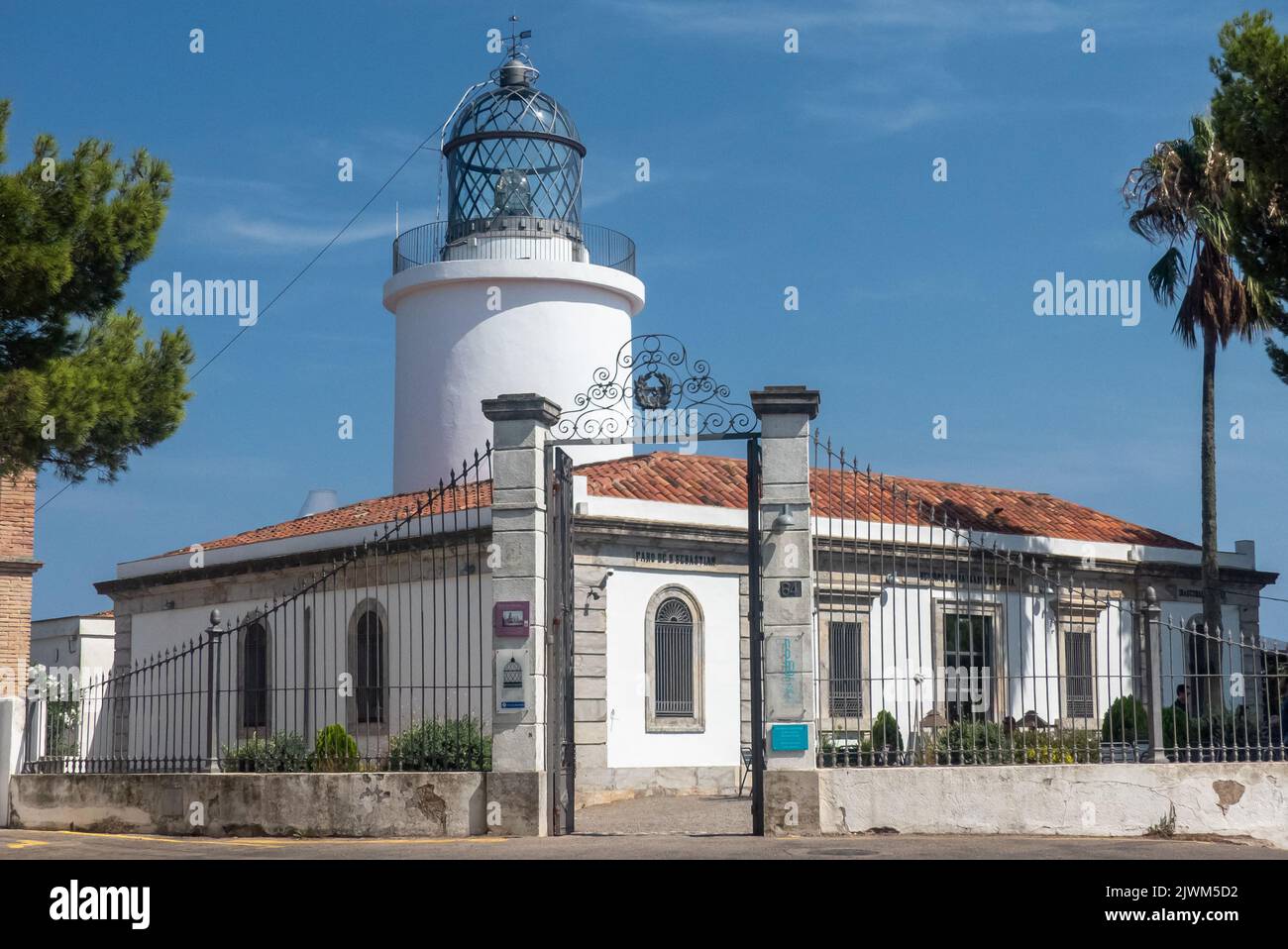 Catalonia in Spain: the Faro de San Sebastian lighthouse Stock Photo