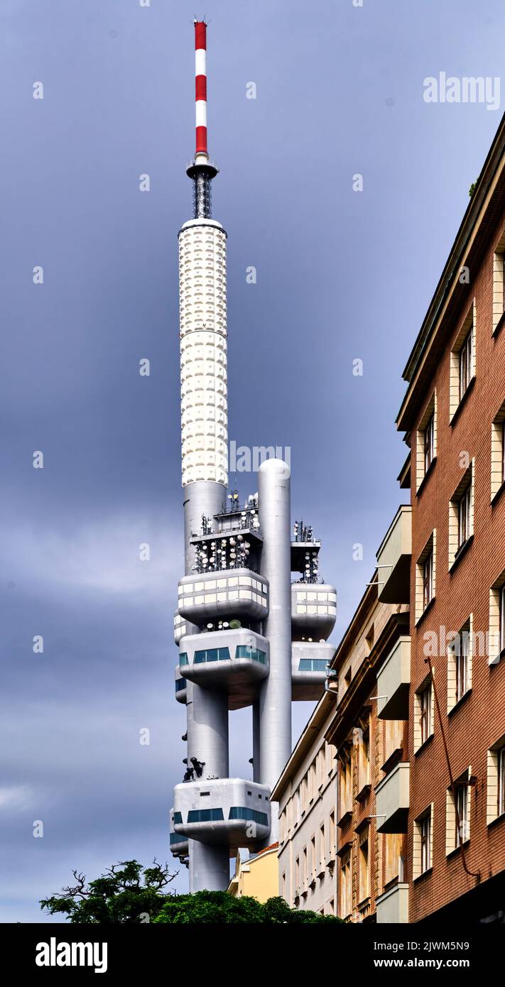 Prague, Czechia, August 30, 2022: Prague TV tower behind the city apartment buildings Stock Photo