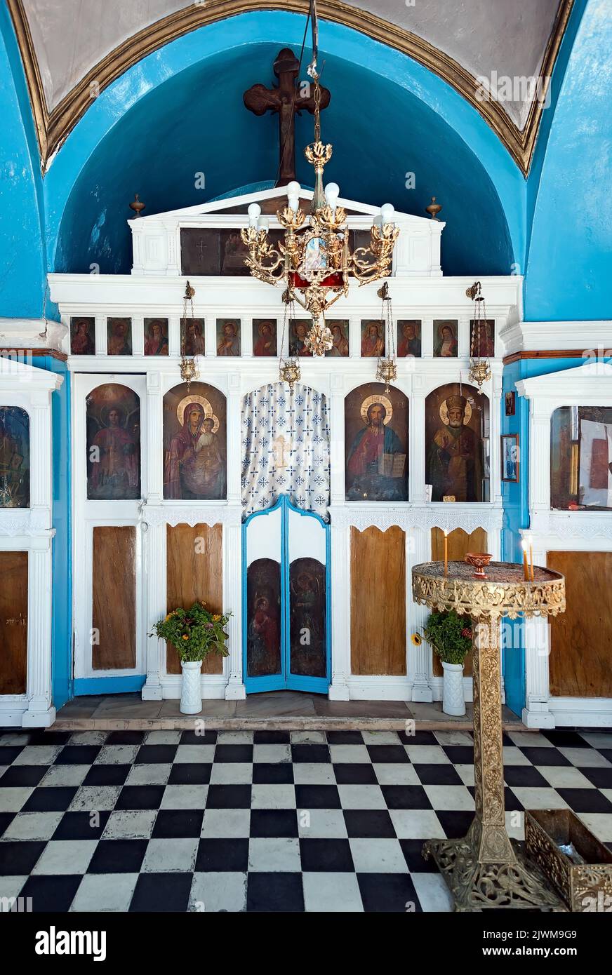 The interior of Agios Nikolakis (Saint Nicholas) church at the port by the sea in Chora town of the Mykonos island in Greece Stock Photo
