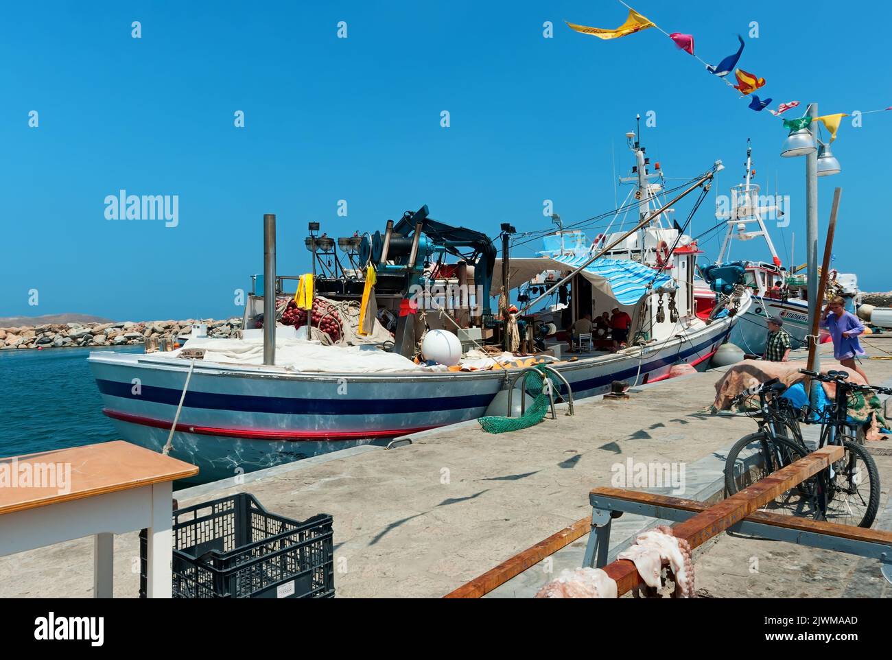 Shipping boats in the port of Naoussa, Paros island, Greece Stock Photo
