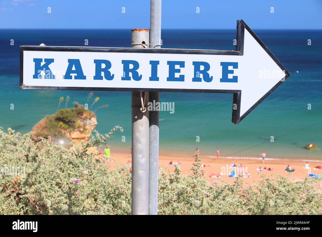 Karriere - career in German language. Beach sign text. Stock Photo