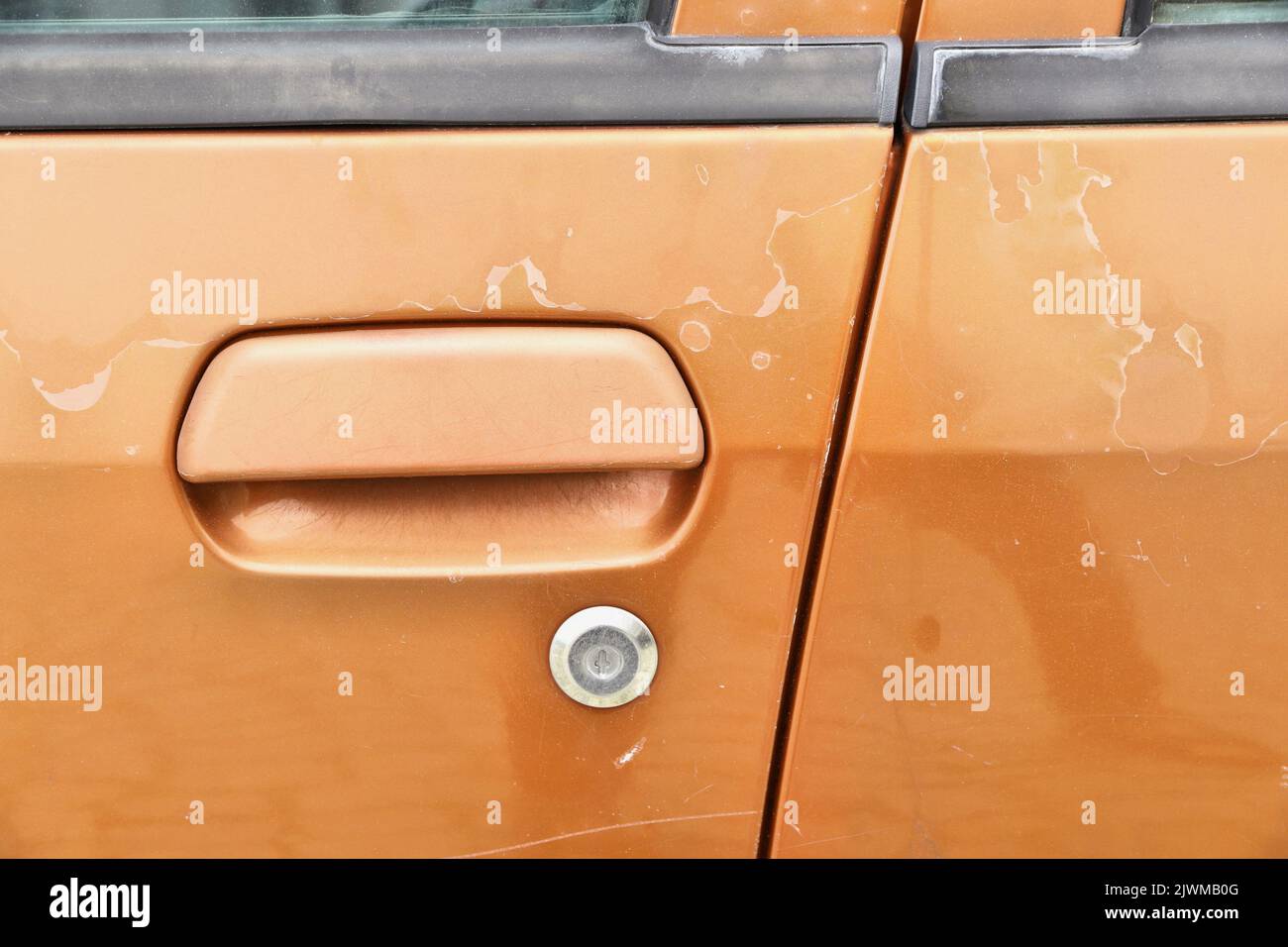 Weathered car paint aging flaking vehicle paint surface. Sun damaged Stock Photo Alamy