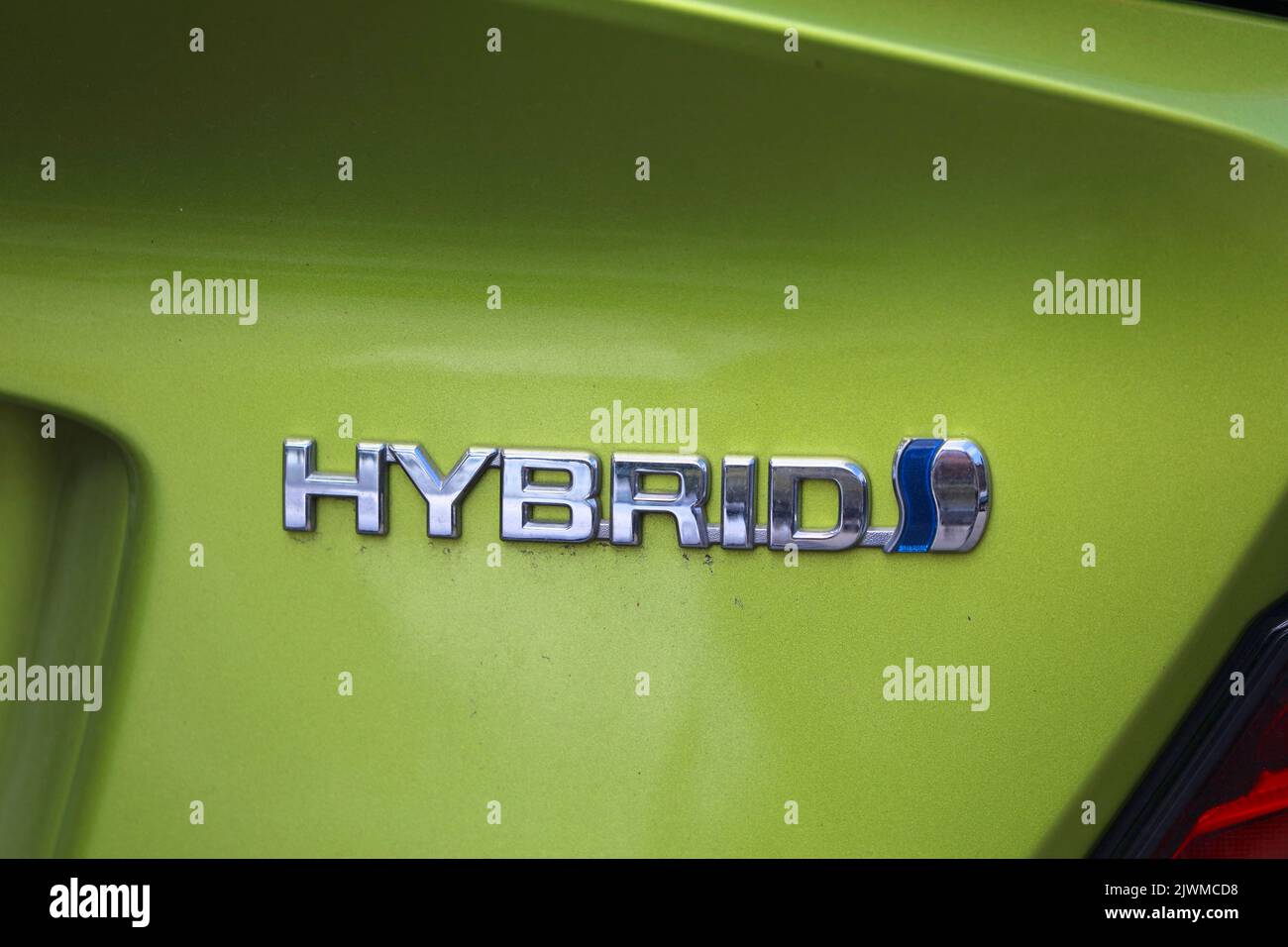 BARCELONA, SPAIN OCTOBER 7, 2021 Hybrid marking on a Toyota car in