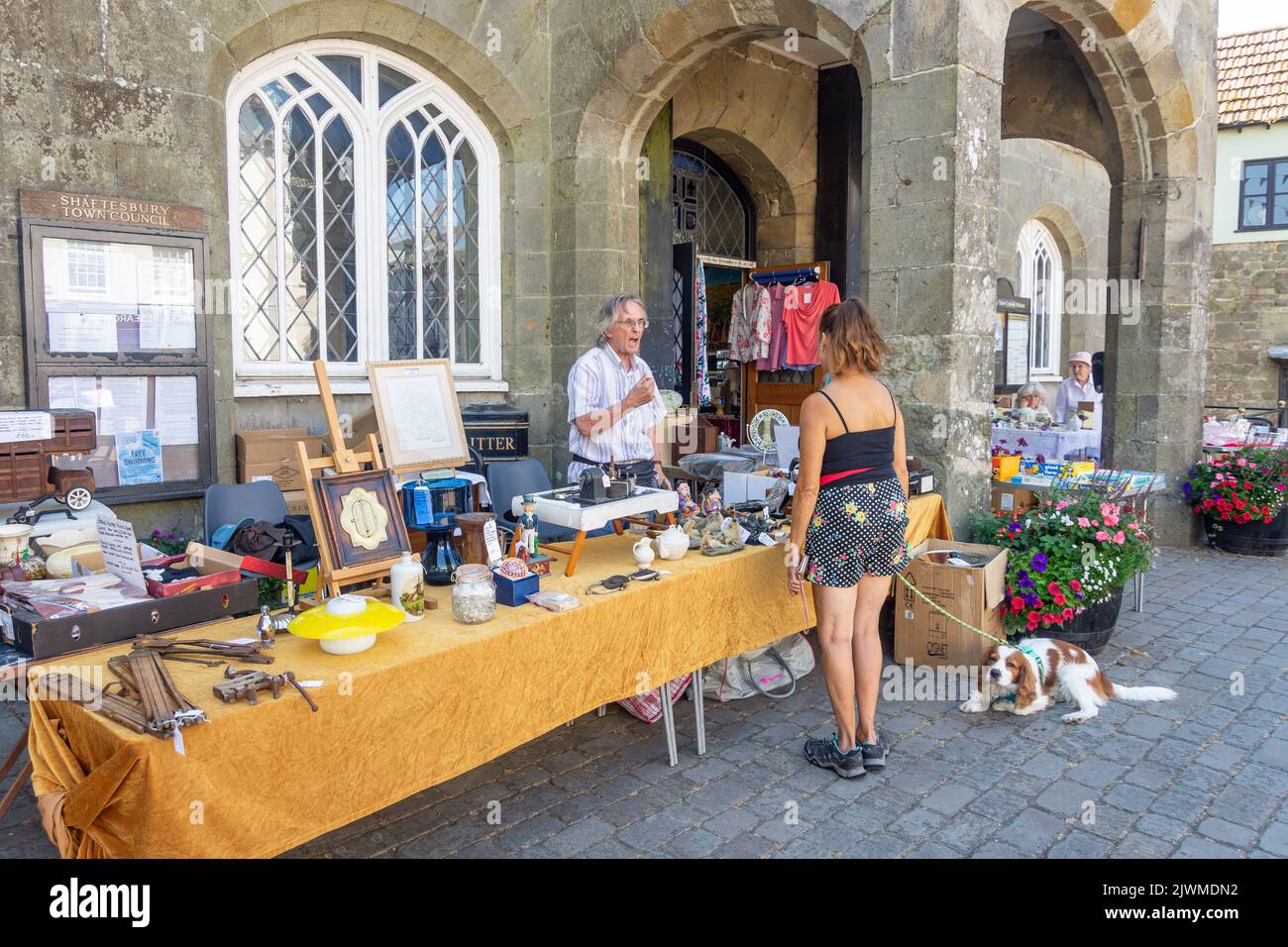 Antique stall outside The Town Hall, High Street, Shaftesbury, Dorset, England, United Kingdom Stock Photo