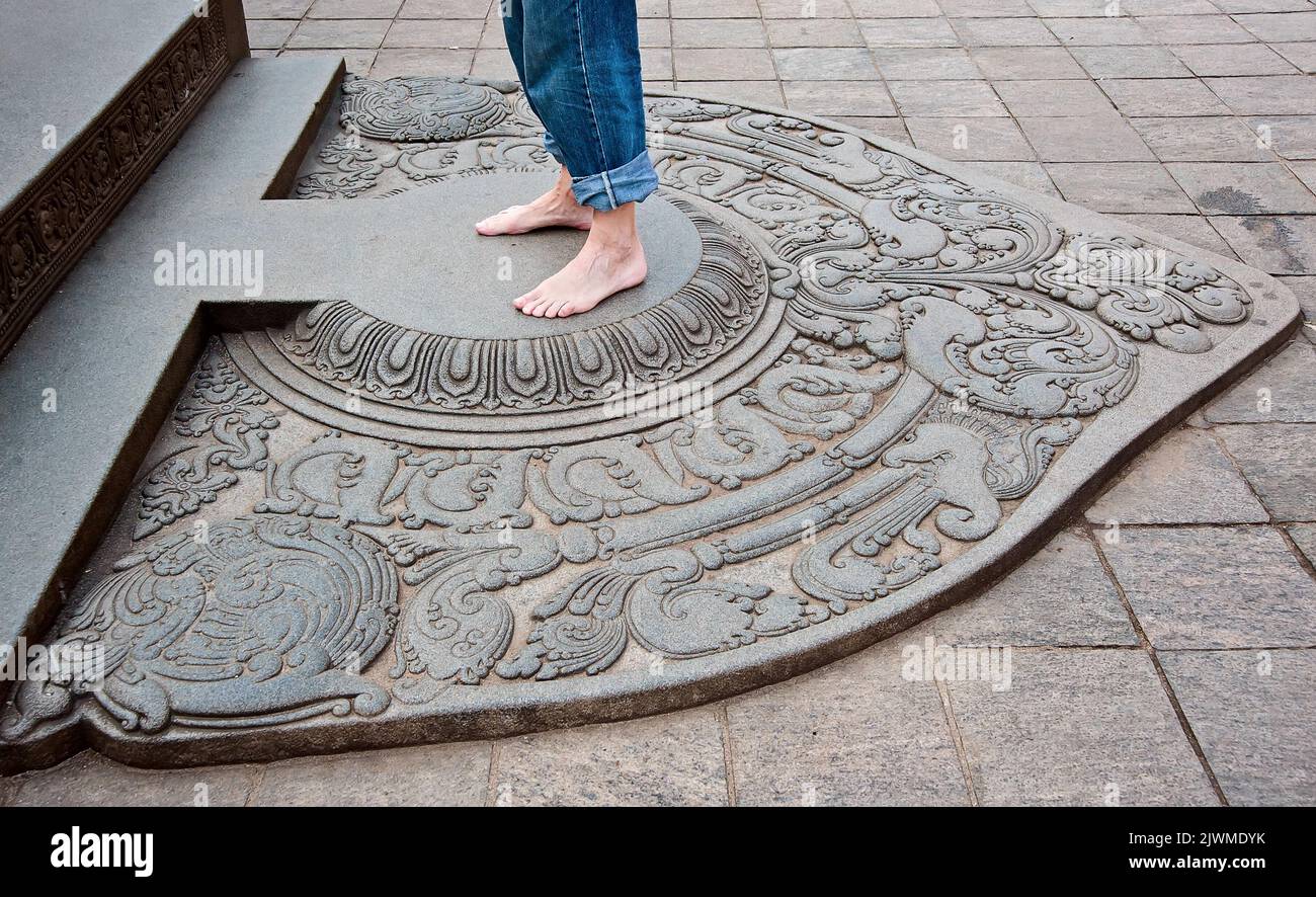 Barefoot in sacred place, Kandy, Sri Kanka Stock Photo
