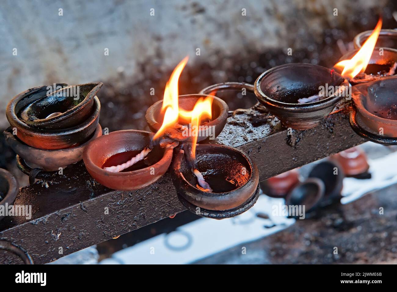 Burning candles on altar in Buddhist temple, Sri Lanka Stock Photo Alamy