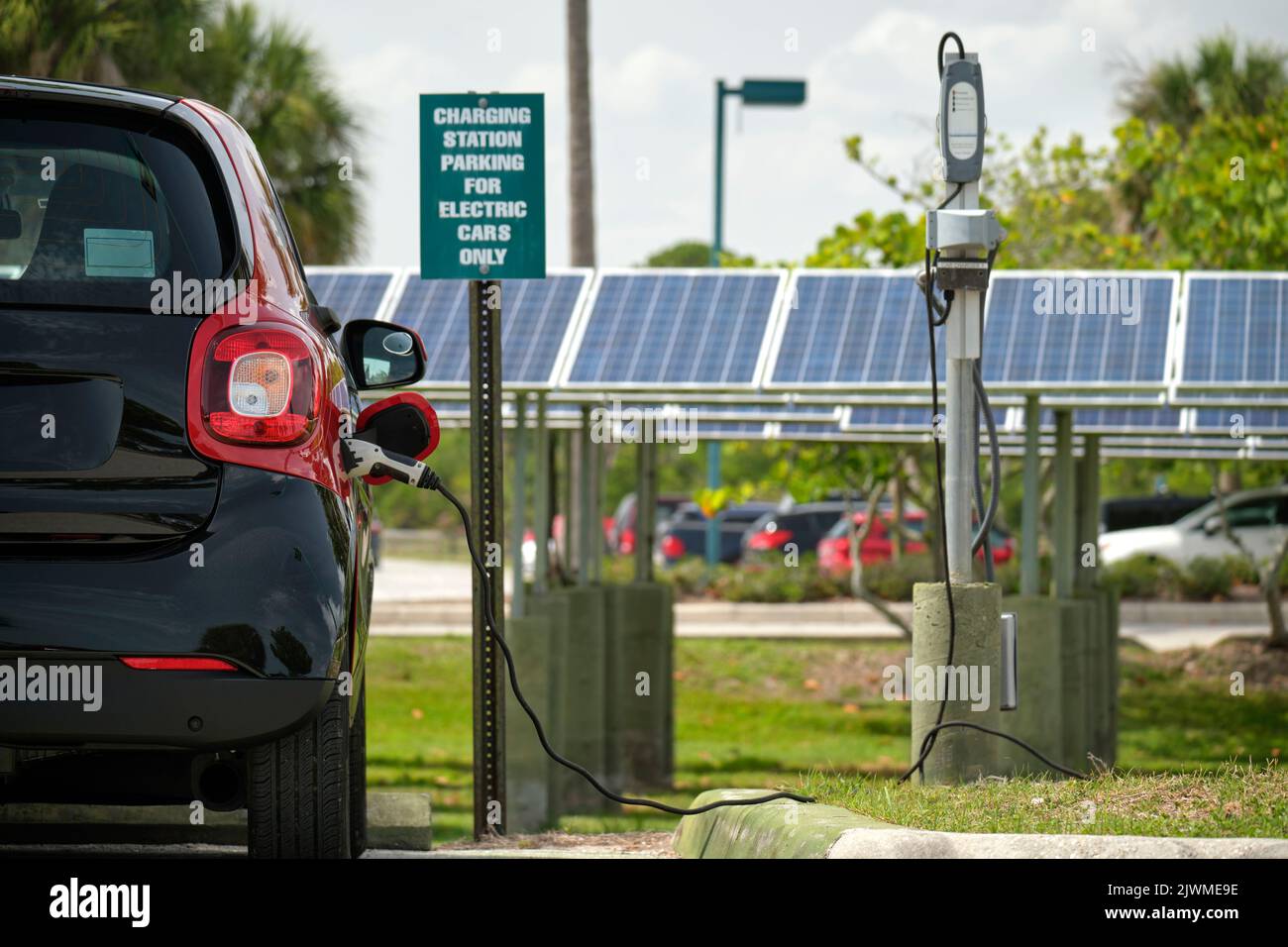 Electric plugin car charging with electricity from solar renewable
