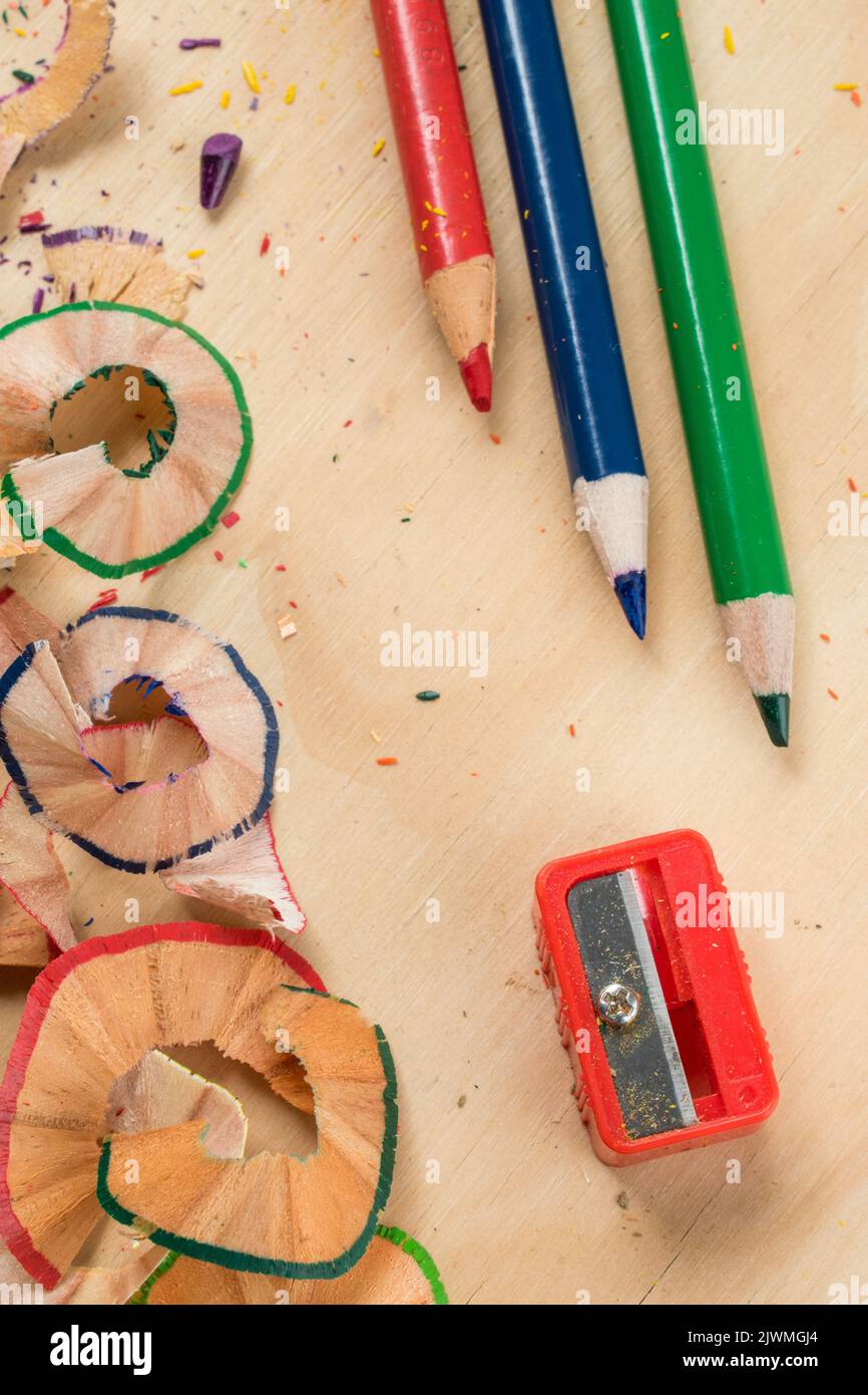 Plastic pencil sharpener and some colored pencils Stock Photo Alamy