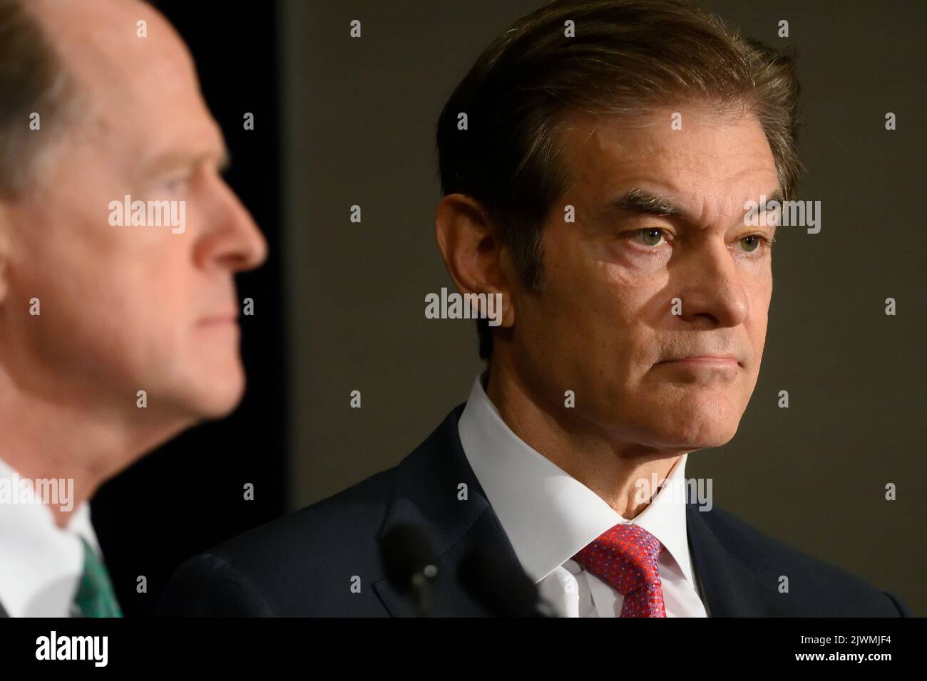 Philadelphia, United States. 06th Sep, 2022. Dr. Mehmet Oz, Republican candidate for the Pennsylvania U.S. Senate, sided by U.S. Senator Pat Toomey (R-PA) discus TV Debate availability of himself and Democratic candidate John Fetterman, during a press conference in Philadelphia, PA, USA, on September 6, 2022. Credit: OOgImages/Alamy Live News Stock Photo