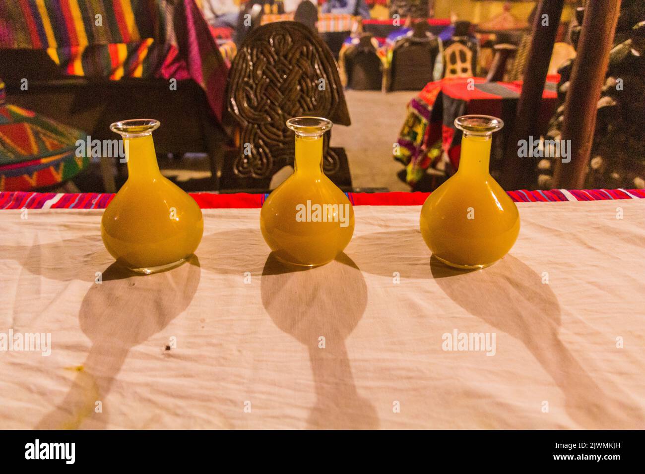 Tej (local honey wine) in traditional glasses, Ethiopia Stock Photo - Alamy