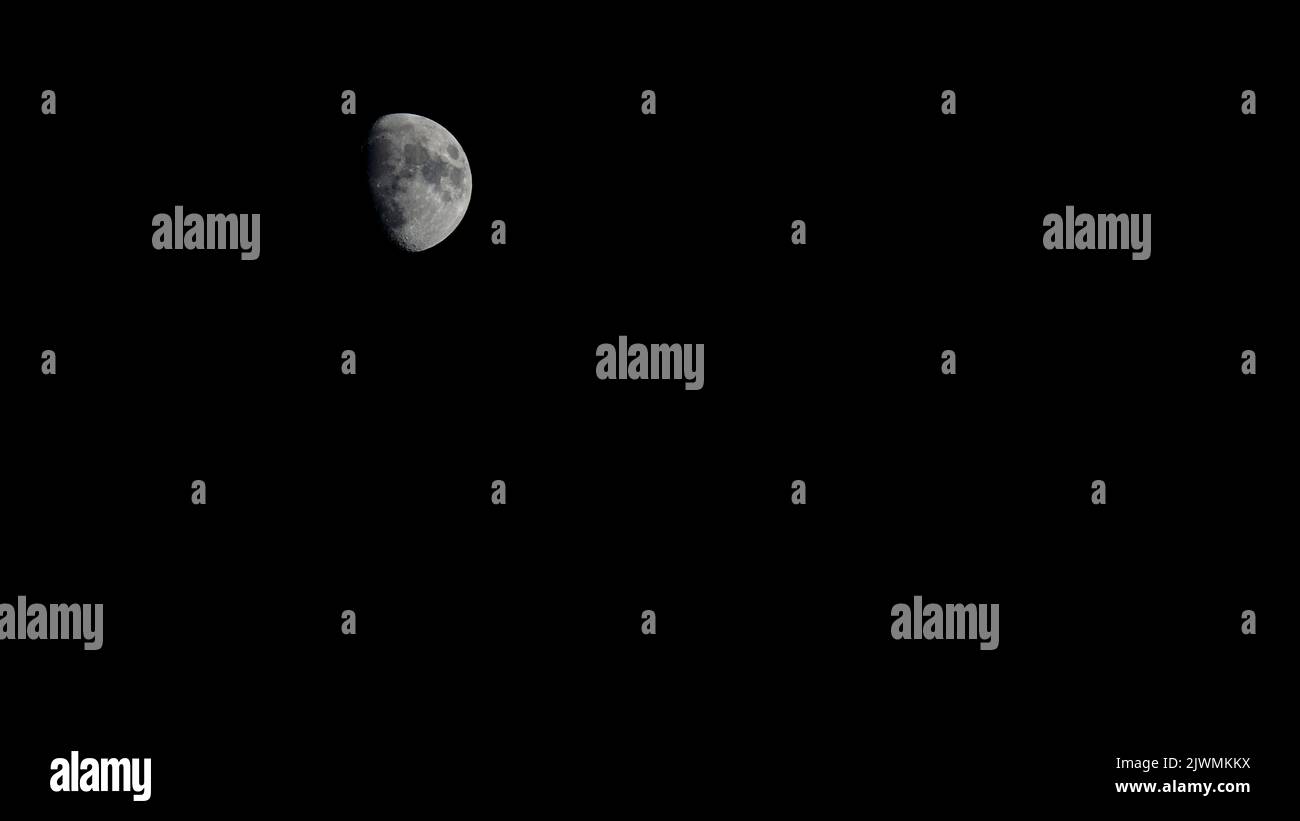 Waxing gibbous moon at night on black sky Stock Photo Alamy