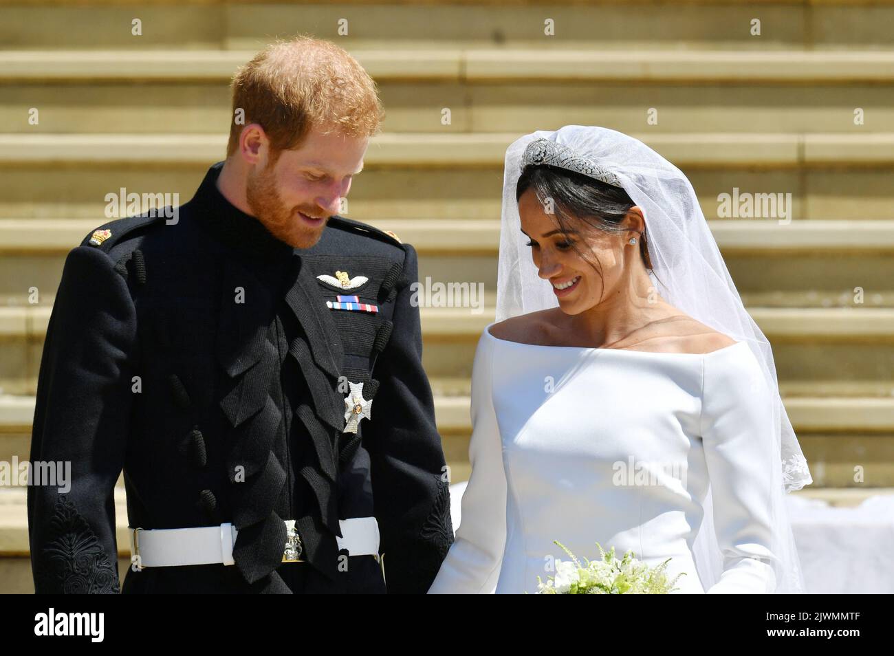 File photo dated 19/05/18 of the Duke and Duchess of Sussex, then Prince Harry and Meghan Markle, walking down the steps of St George's Chapel in Windsor Castle after their wedding. The Duchess of Sussex has expressed her frustration at being told a 'million times over' that she was lucky the Duke of Sussex had chosen her when they became engaged in her latest Archetypes podcast for Spotify. Issue date: Tuesday September 6, 2022. Stock Photo