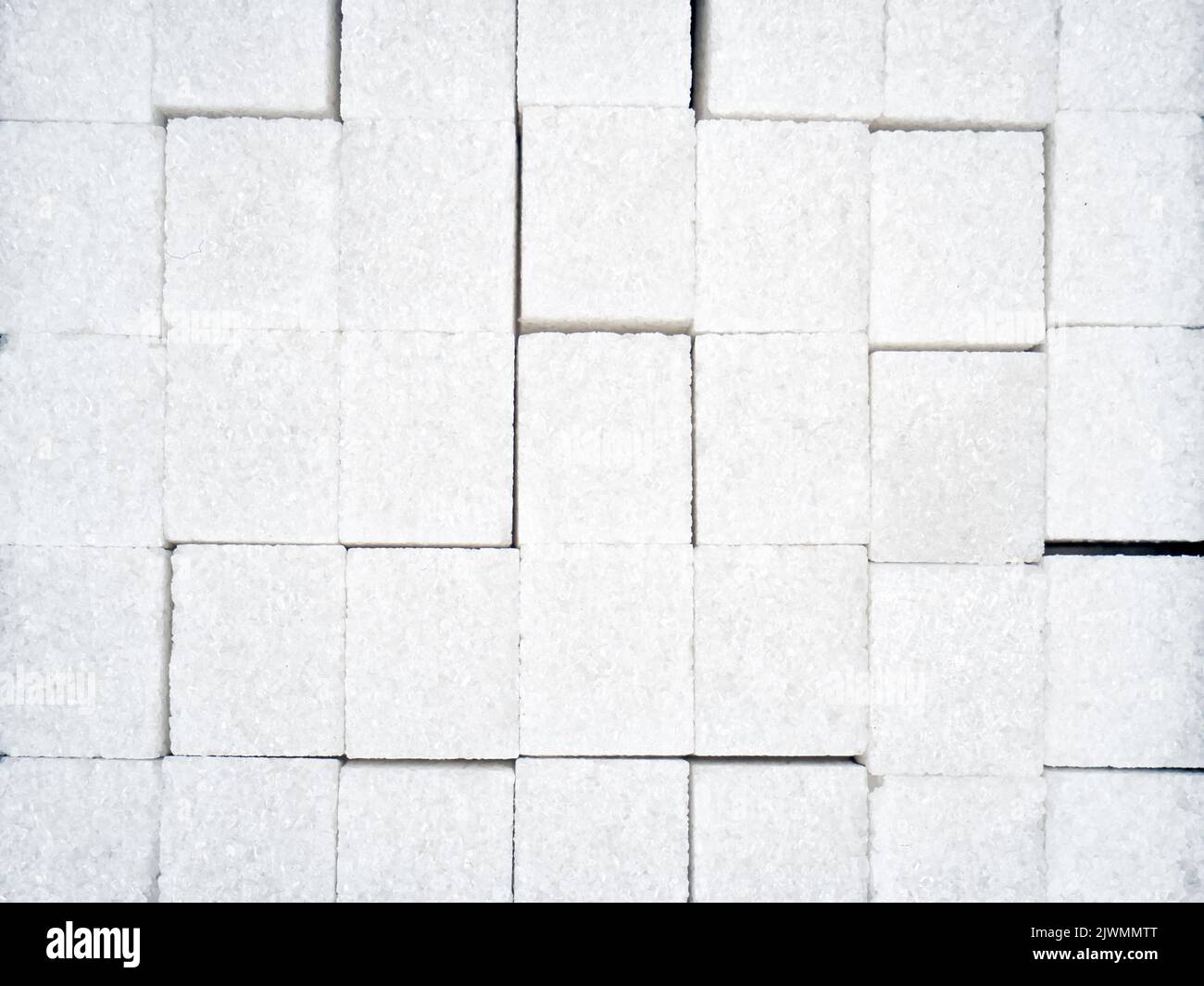 texture of white sugar cubes closeup Stock Photo