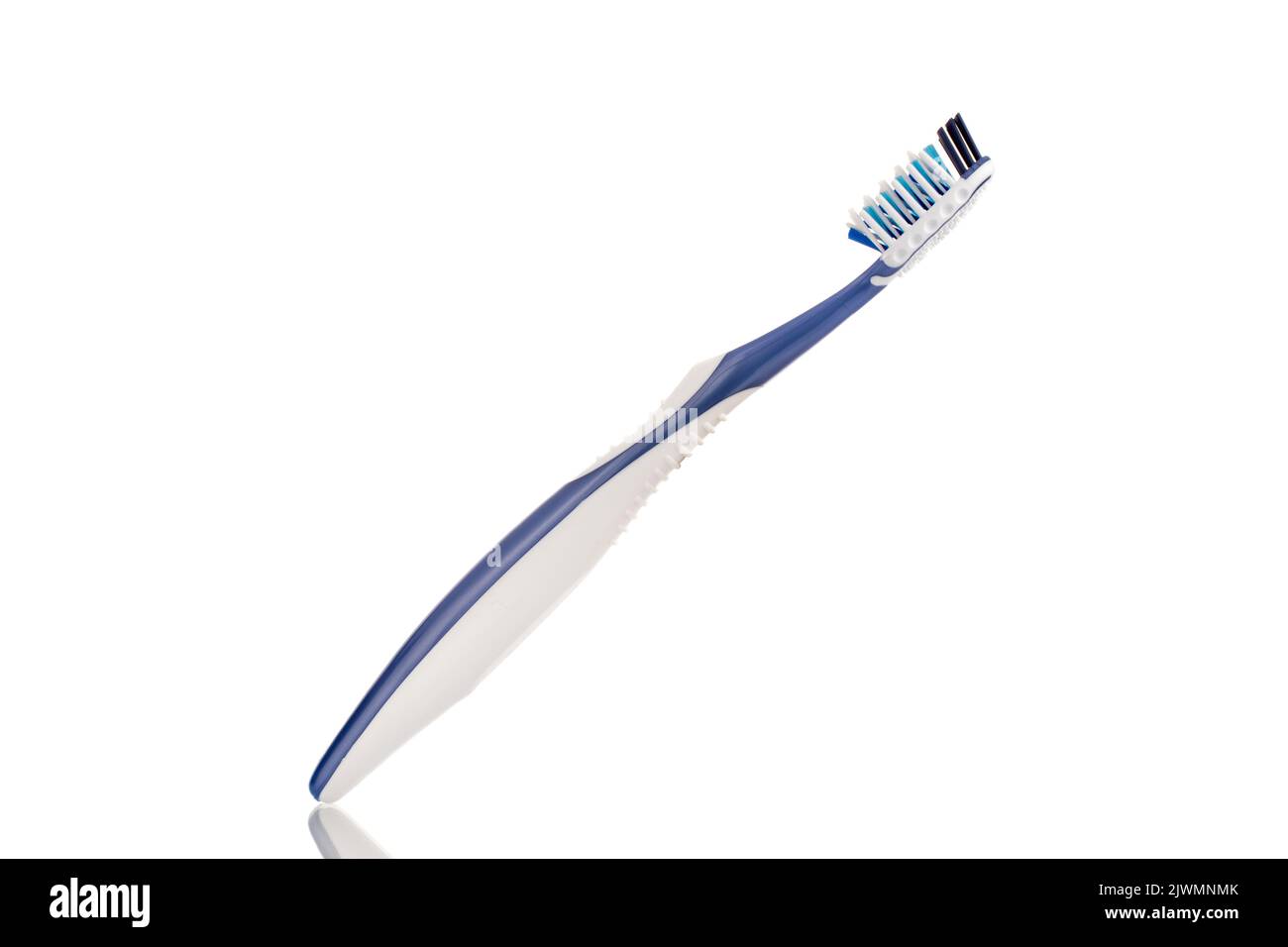 One plastic toothbrush, close-up, isolated on a white background Stock ...