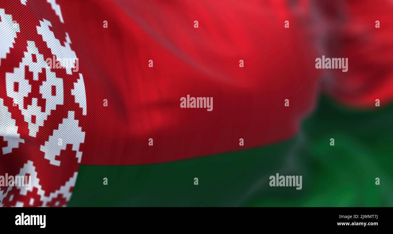 Close-up view of the belarusian national flag waving in the wind. The Republic of Belarus is a landlocked country in Eastern Europe. Fabric textured b Stock Photo