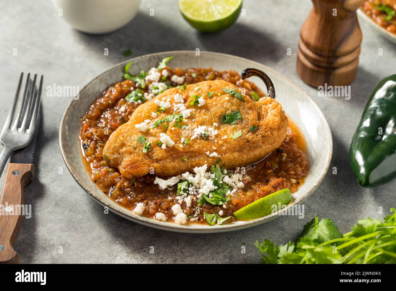 Homemade Fried Poblano Chili Relleno Stuffed with Cheese Stock Photo