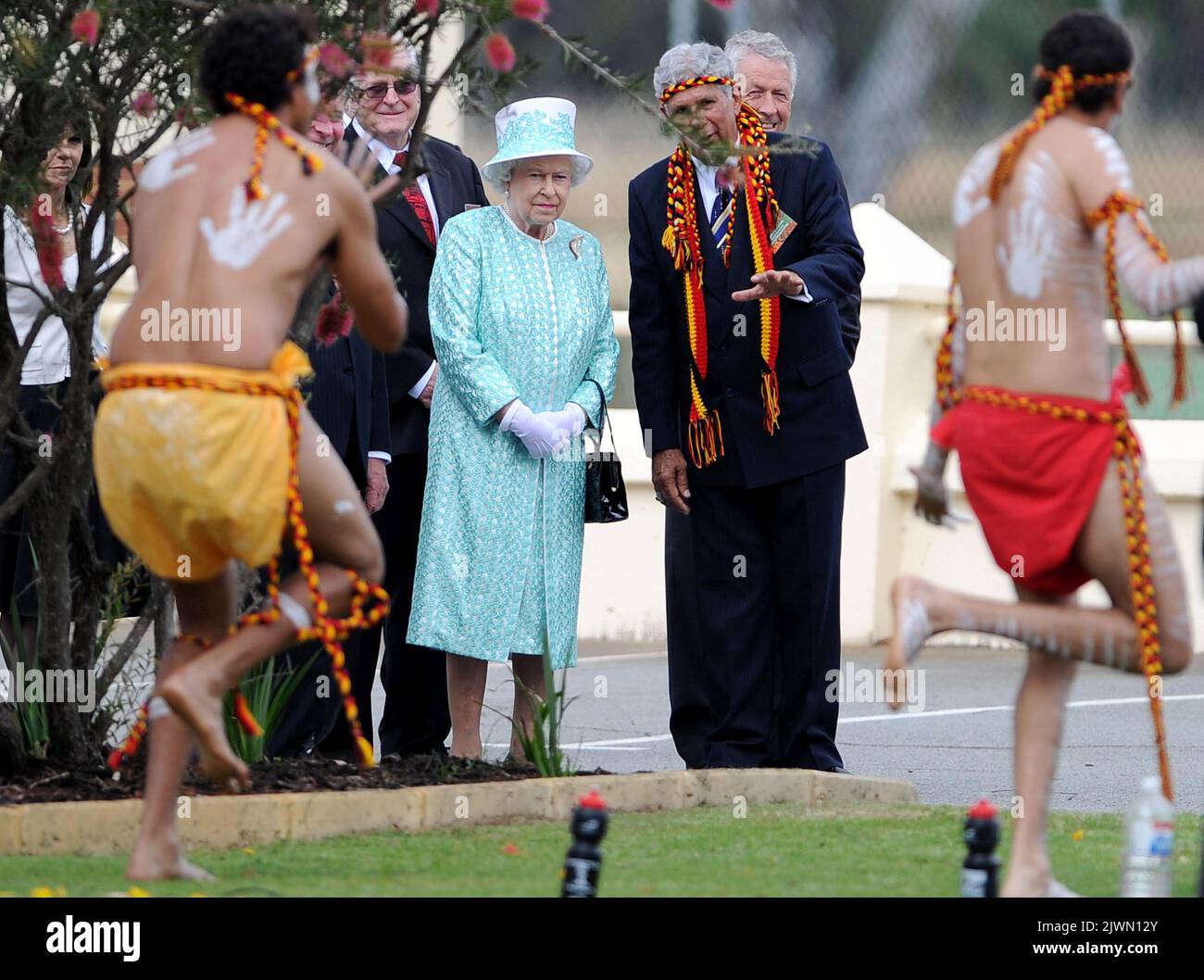 Britain's Queen Elizabeth II (C) watches Aboriginal dancers as she ...
