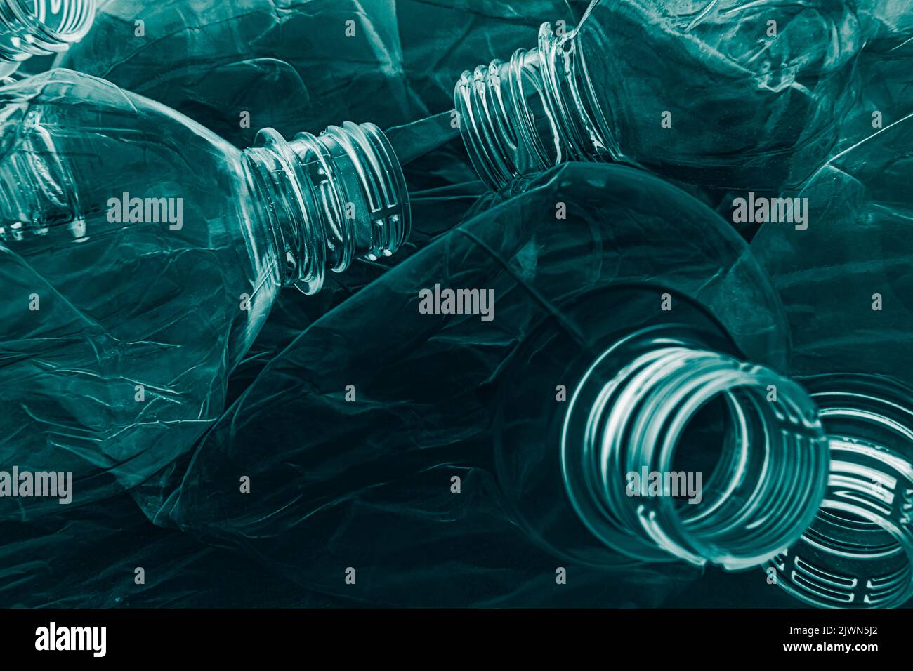 marine pollution plastic recycling bottles teal Stock Photo