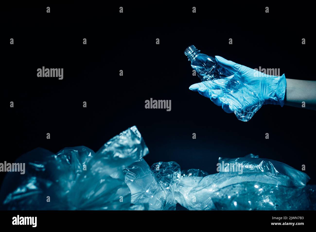 waste management plastic recycling volunteer hand Stock Photo Alamy