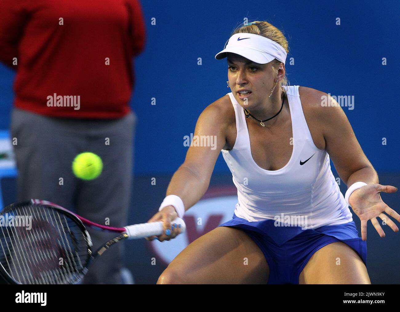 Sabine Lisicki of Germany returns to Maria Sharapova of Russia, during