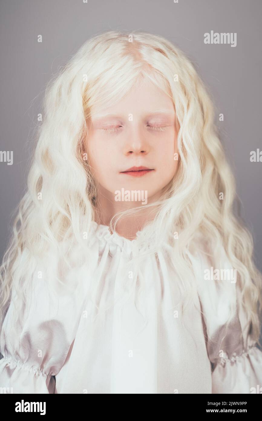 sweet little girl angel innocence albino blonde Stock Photo