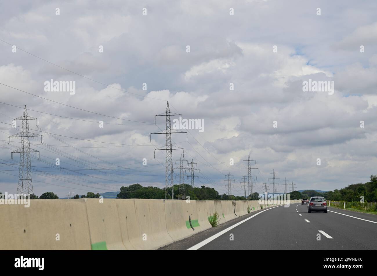 Steel lattice mast for the suspension of an overhead electrical line Stock Photo