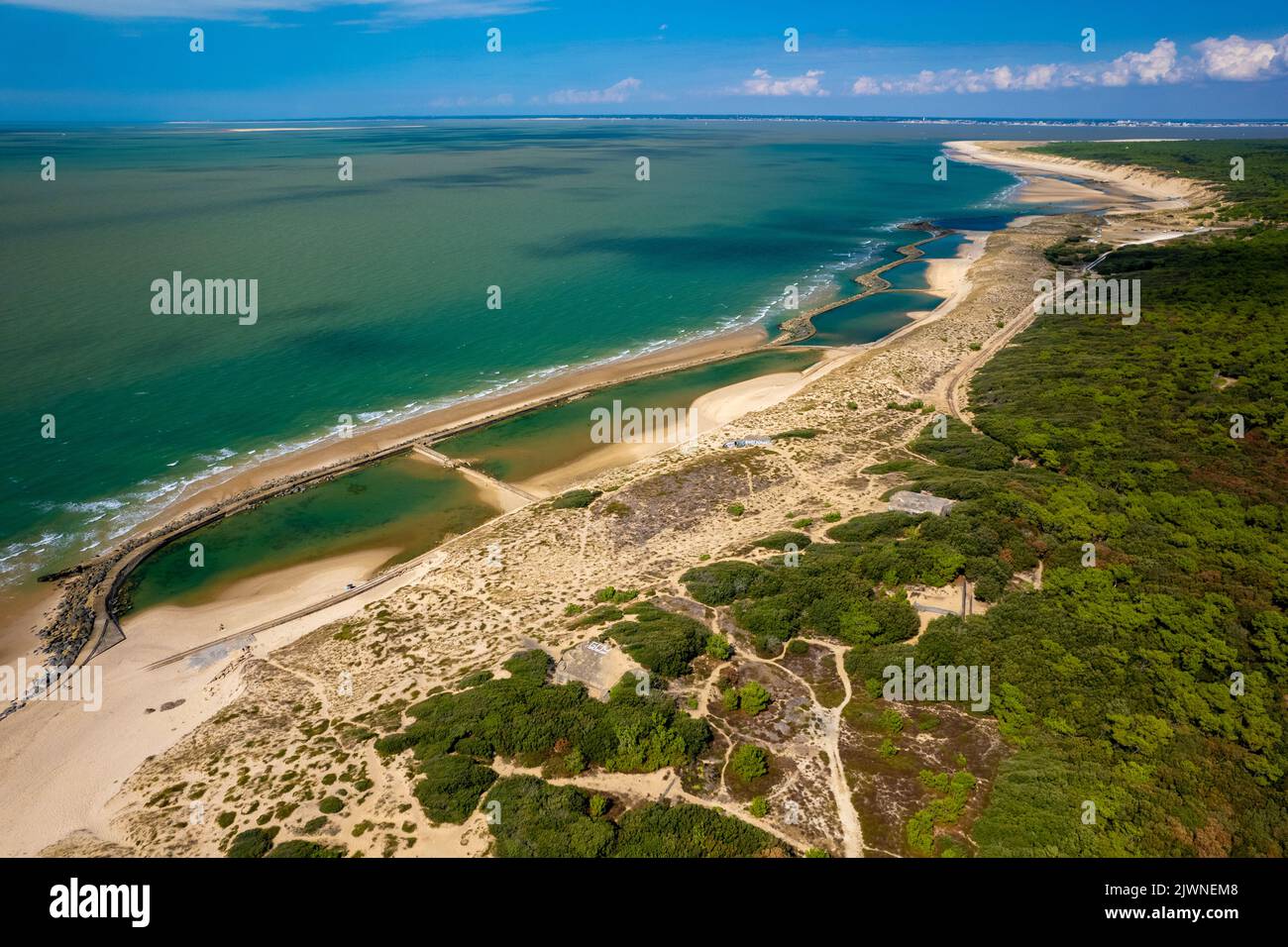 Aerial shot of the Soulac coastline in Gironde France with saltwater pools formed by canon rails of world war II Stock Photo