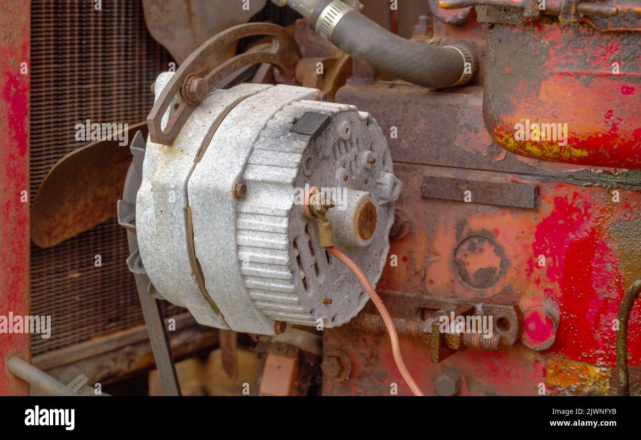 Old and weathered alternator and engine Stock Photo Alamy