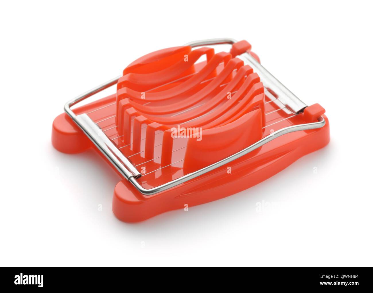 Red plastic wire egg slicer isolated on white Stock Photo